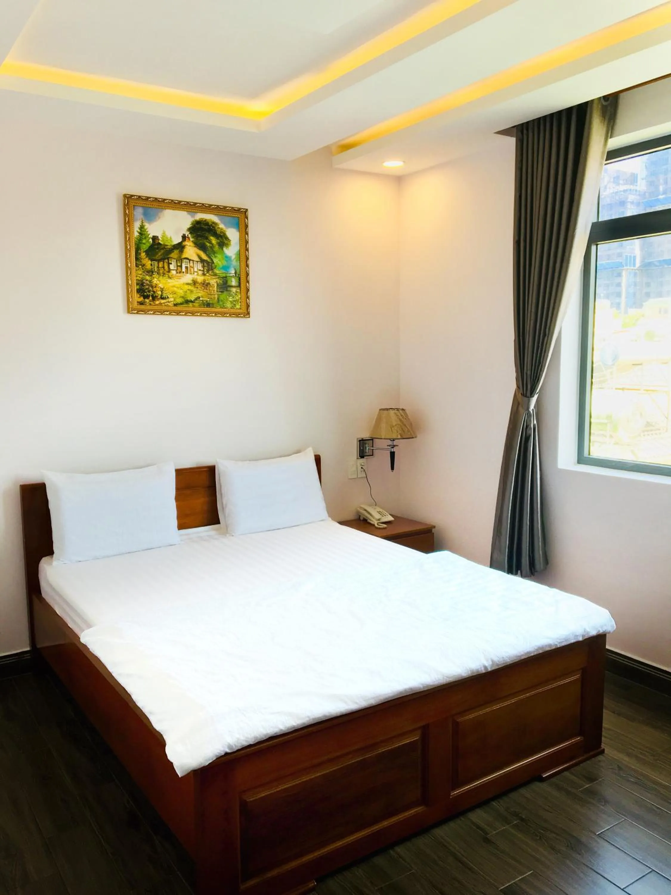 Bed in QUEEN VICTORIA Hotel