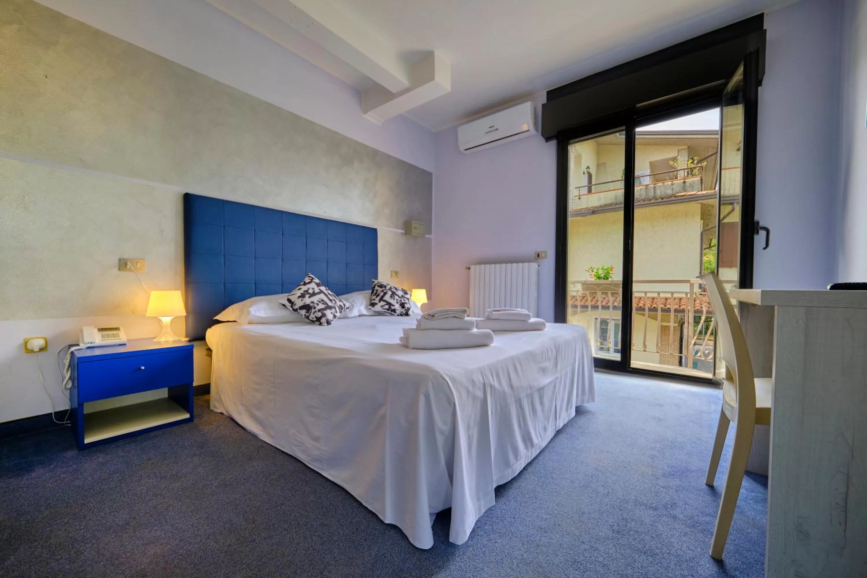 Bed in HOTEL VITTORIA