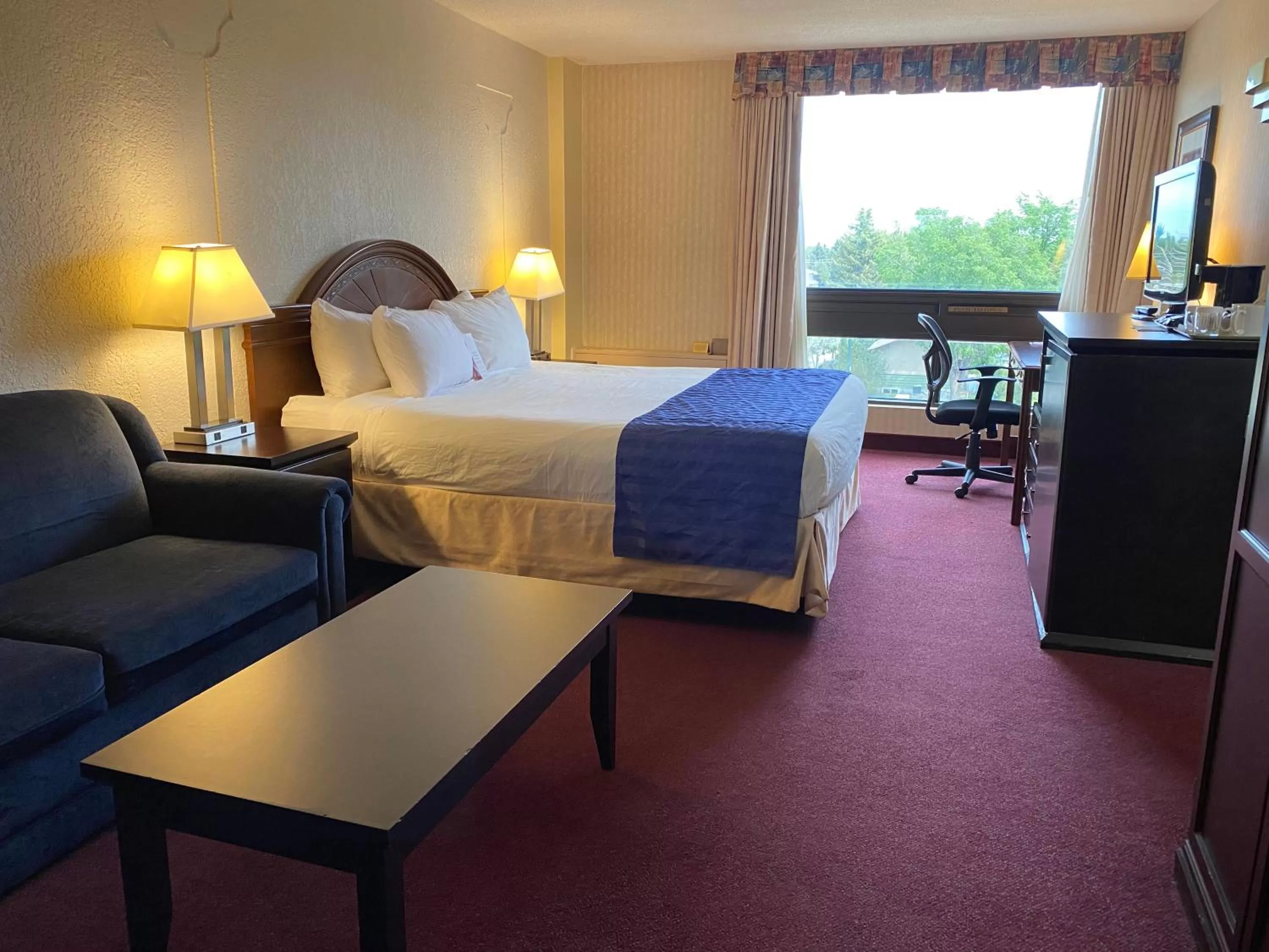 Bed in Ramada by Wyndham Lethbridge