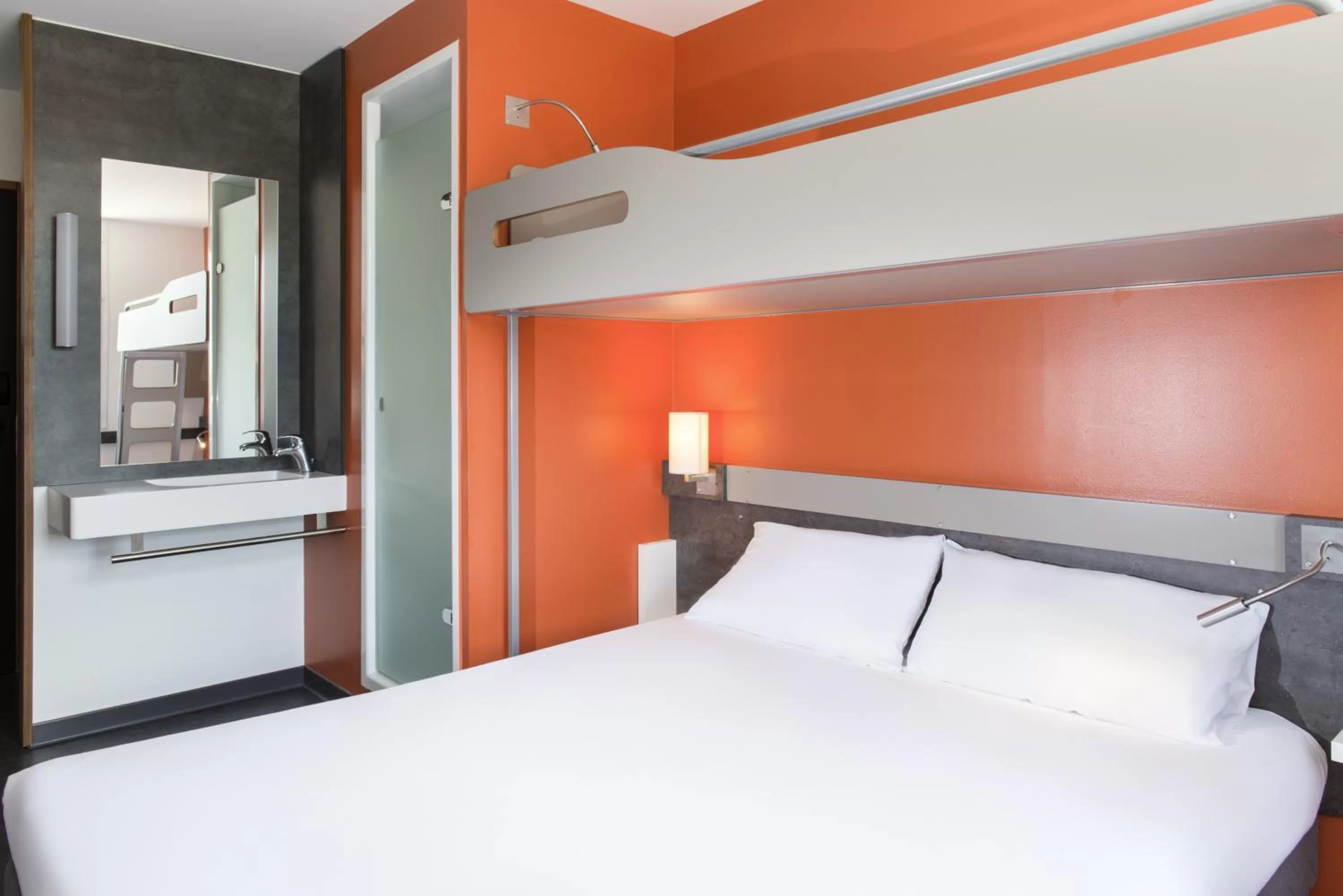 Bathroom, Bed in ibis budget Aéroport Lyon Saint Exupéry