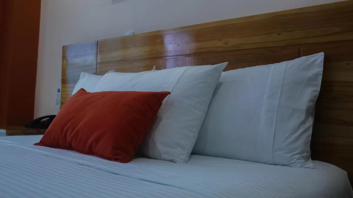 Bed in Kamaleb Farallones Hotel