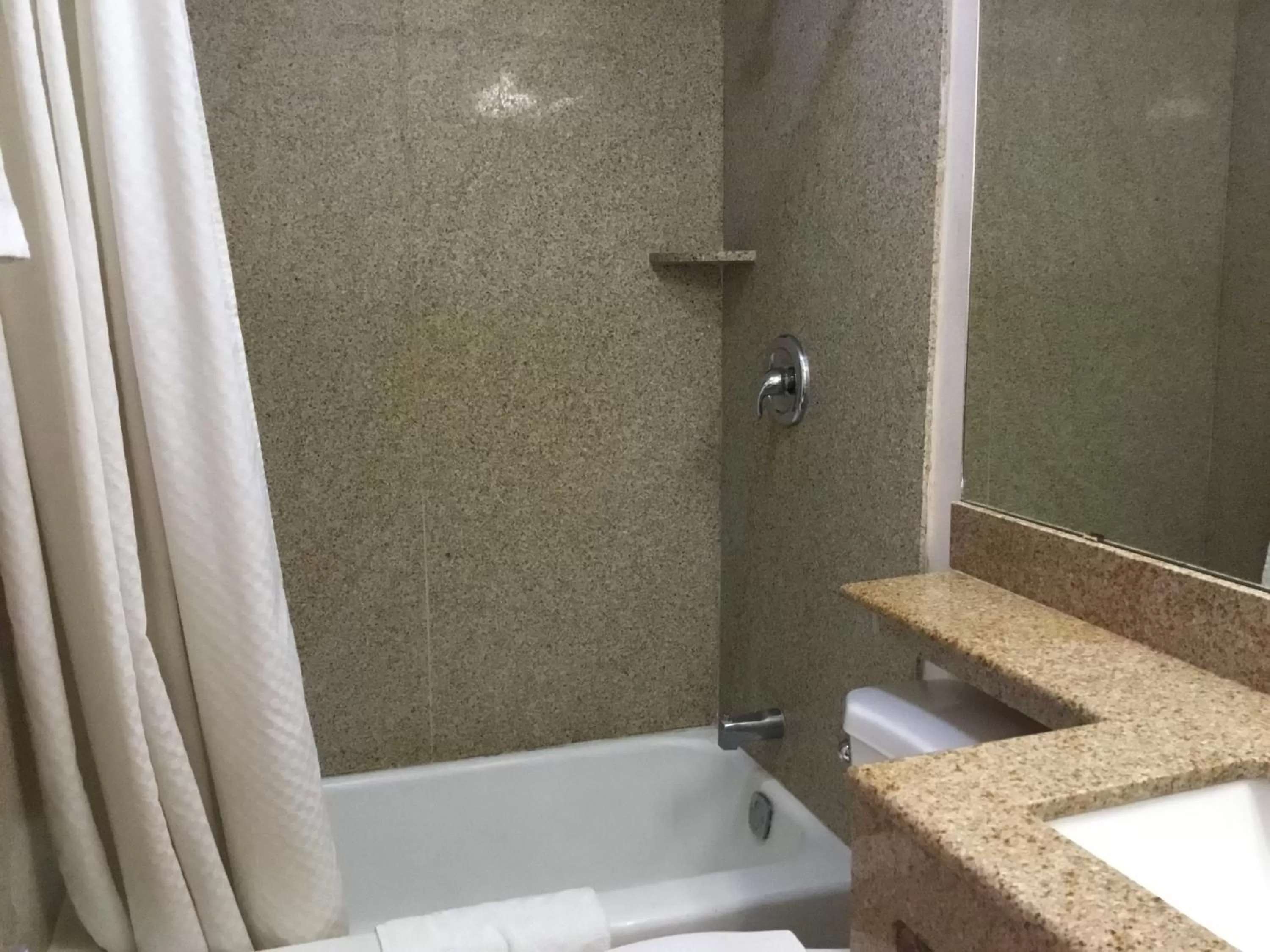 Bathroom in Budget Inn Plainview