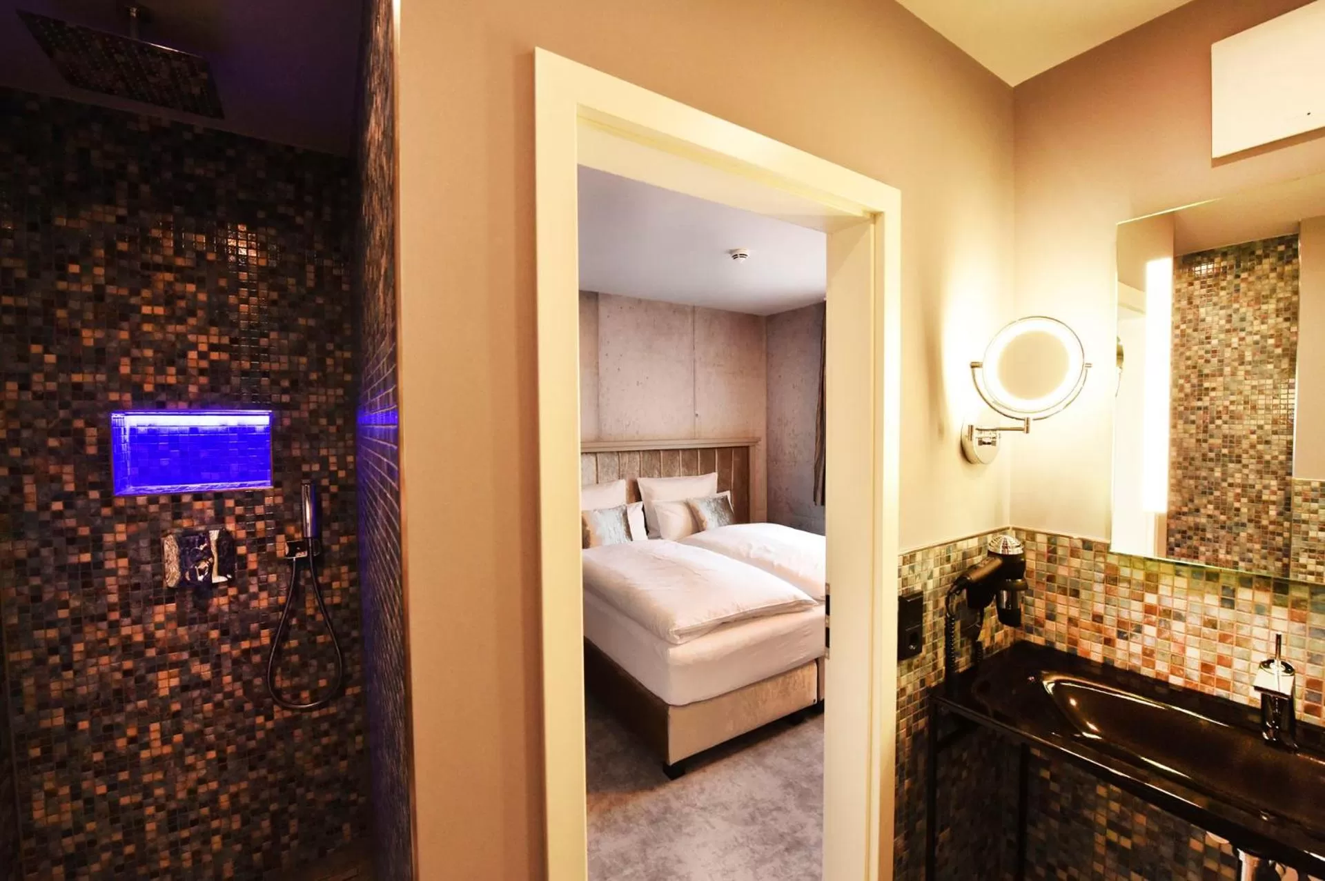 Photo of the whole room, Bed in MOMENTS Boutique Hotel