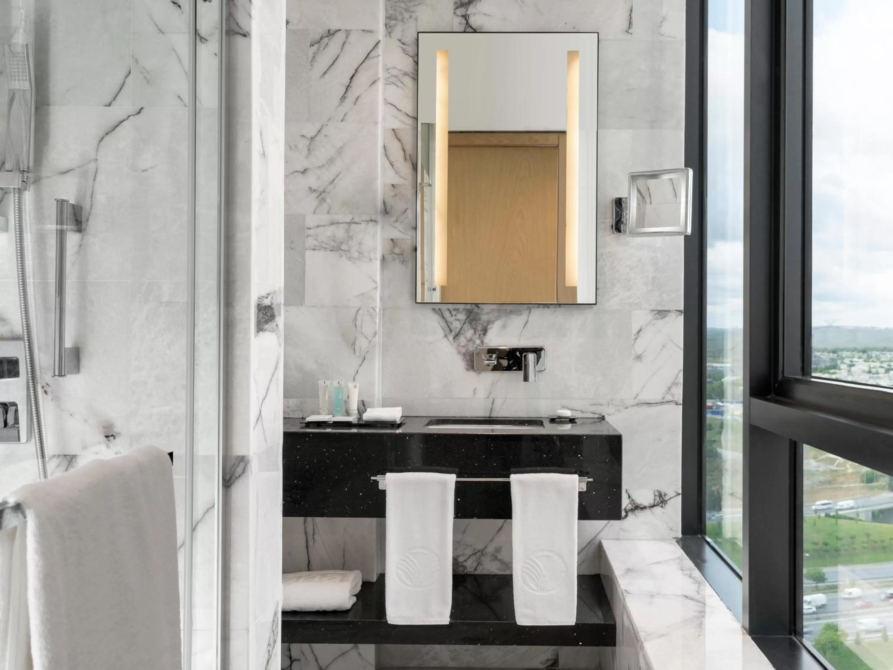Bathroom in WestSide Residences by Rotana