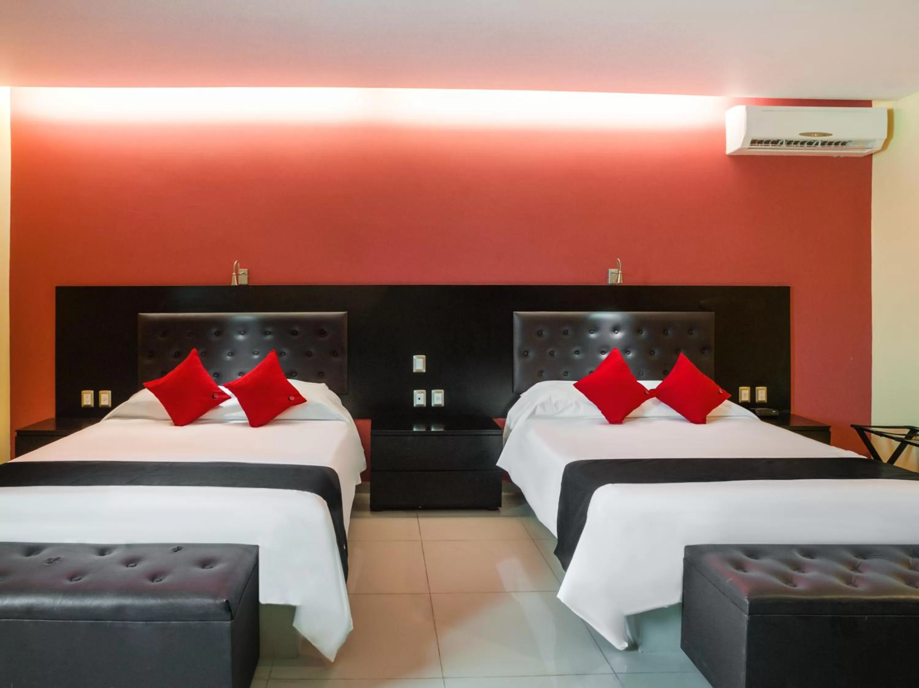 Bed in Veracruz Suites Hotel