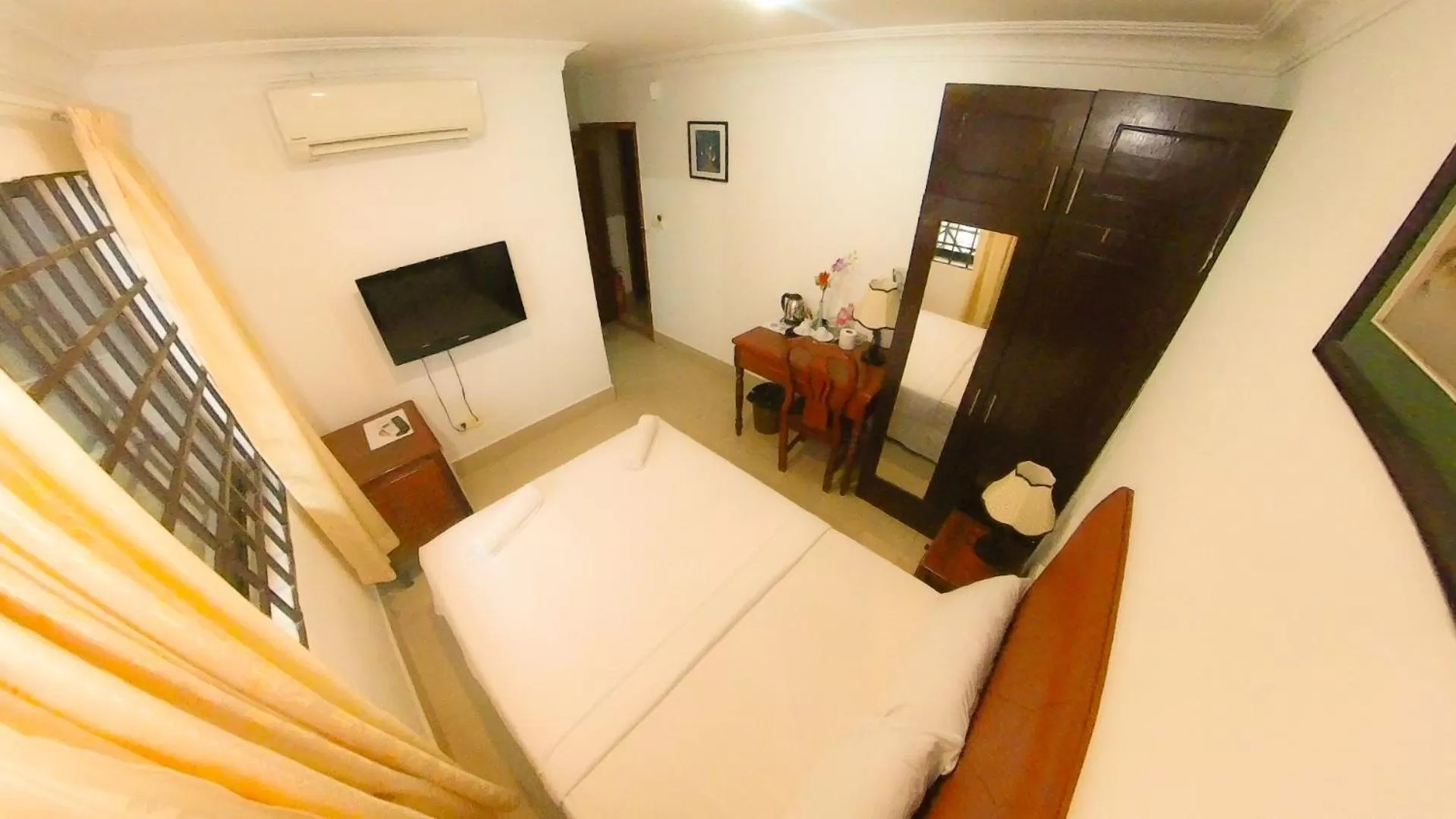 Bed in Riverside Hotel Phnom Penh