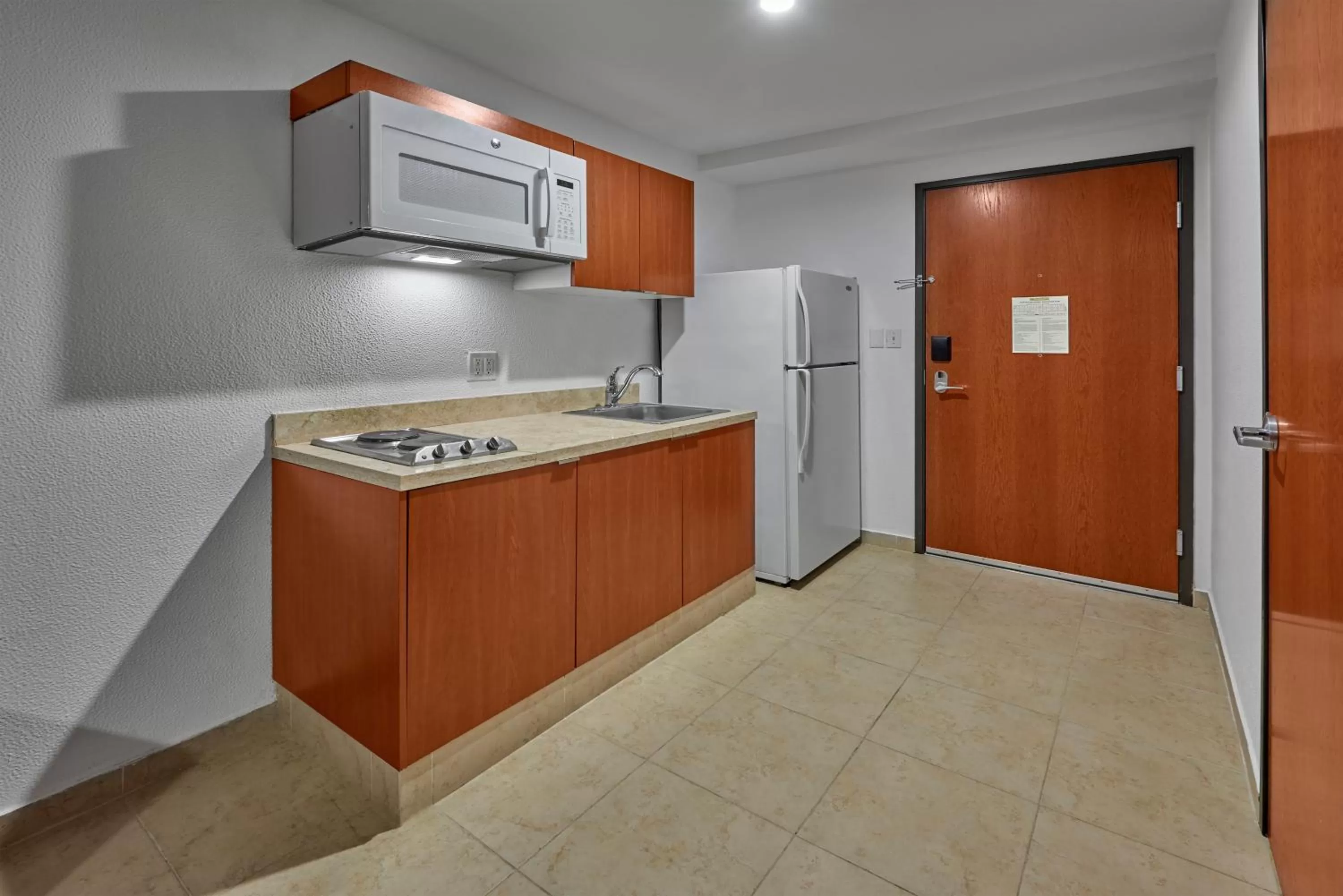 Kitchen or kitchenette in Extended Suites Monterrey Aeropuerto
