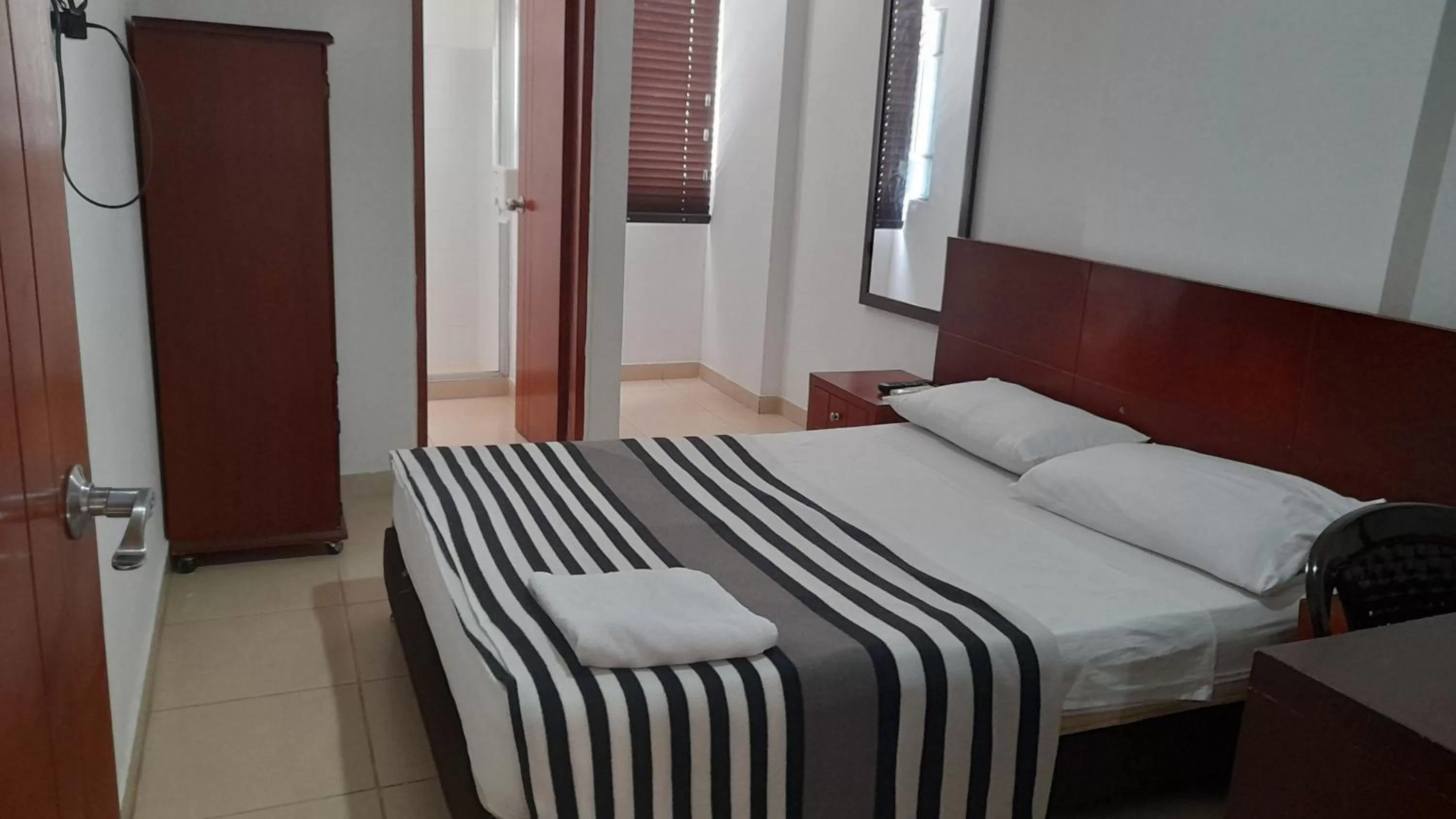 Bed in Hotel Santorini Neiva