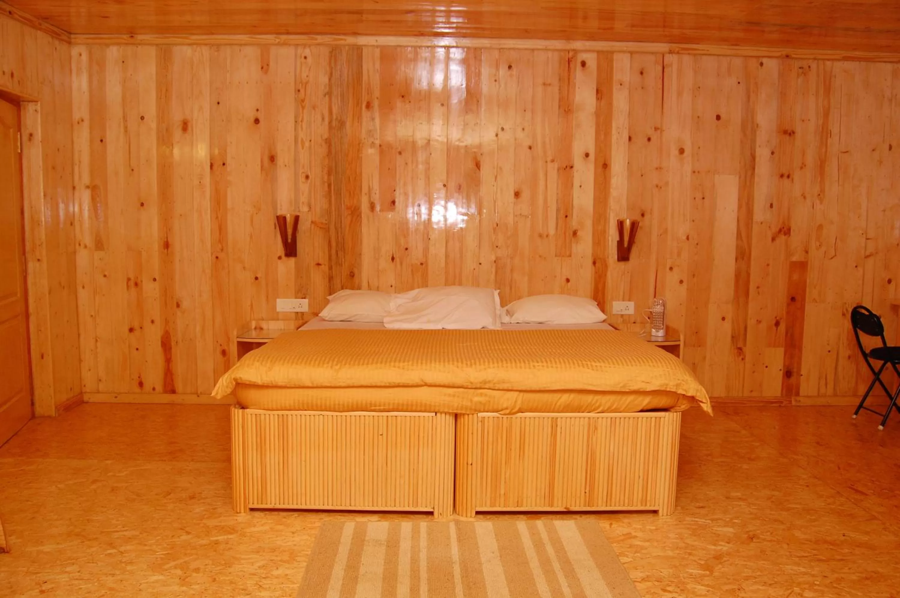 Photo of the whole room, Bed in Surya Holidays Kodaikanal