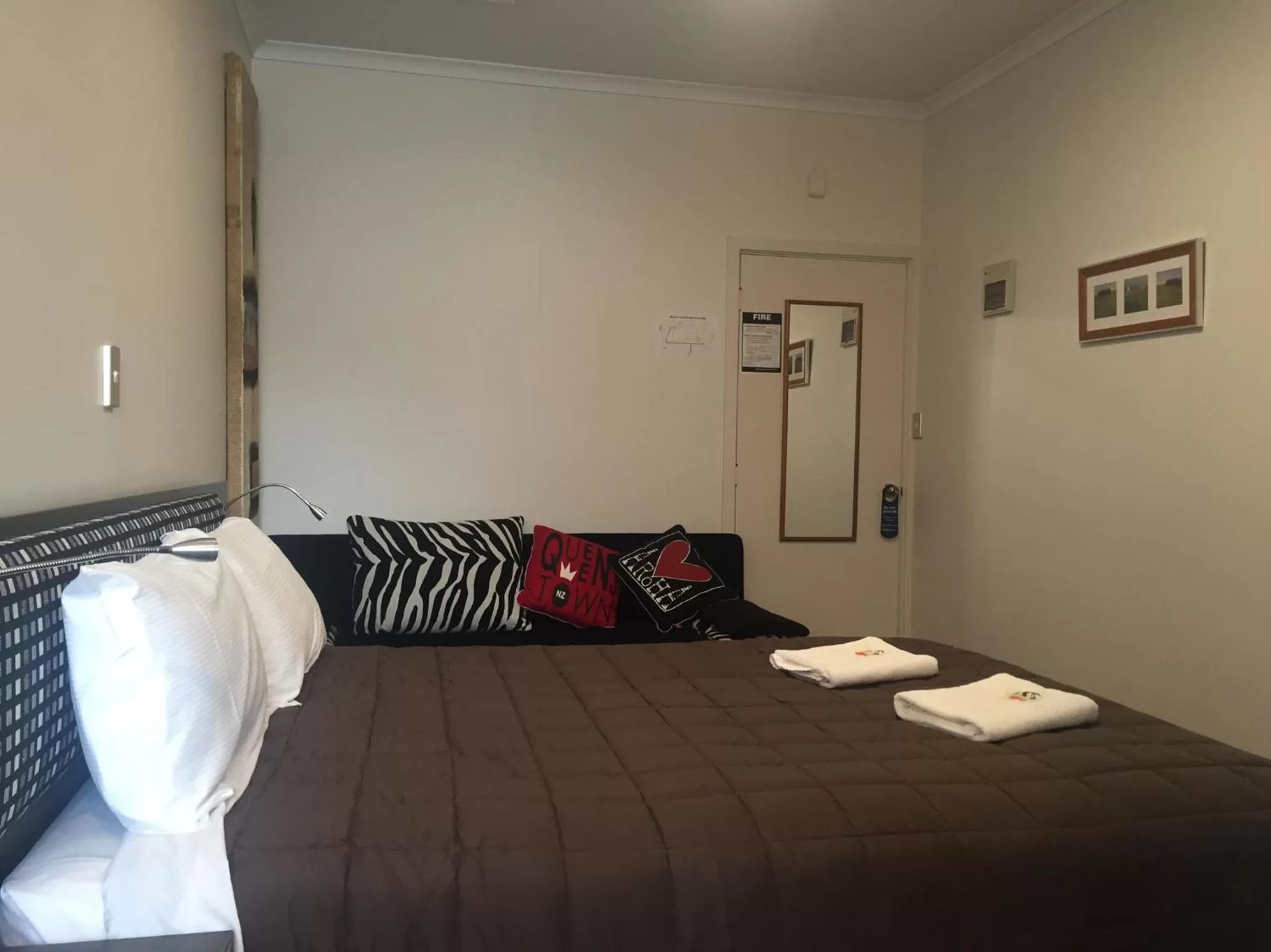 Photo of the whole room, Bed in Motel on Carroll