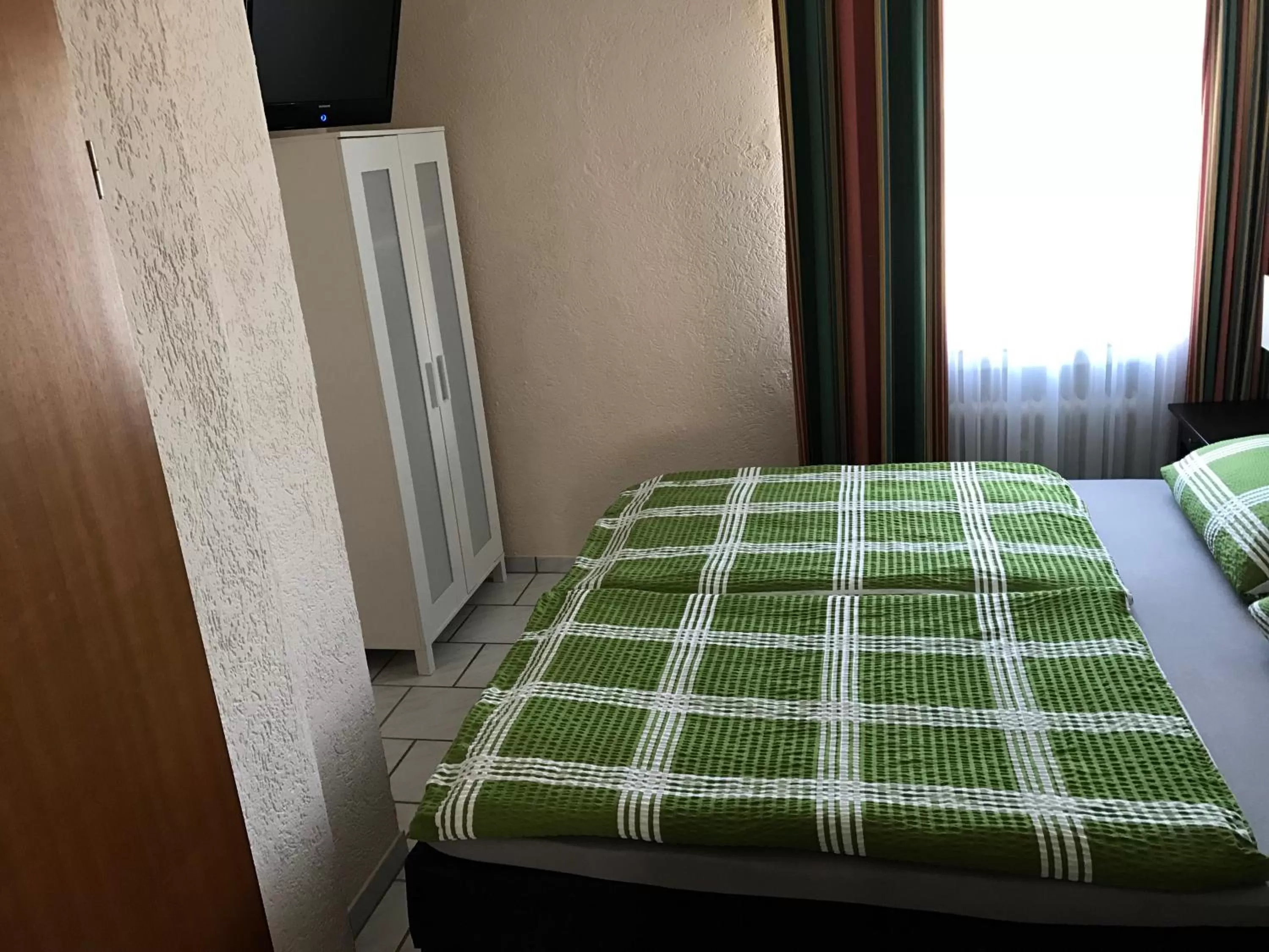 Decorative detail, Bed in Hotel Rhein INN