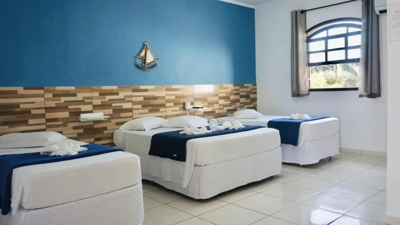 Bed in Beija Flor Pousada