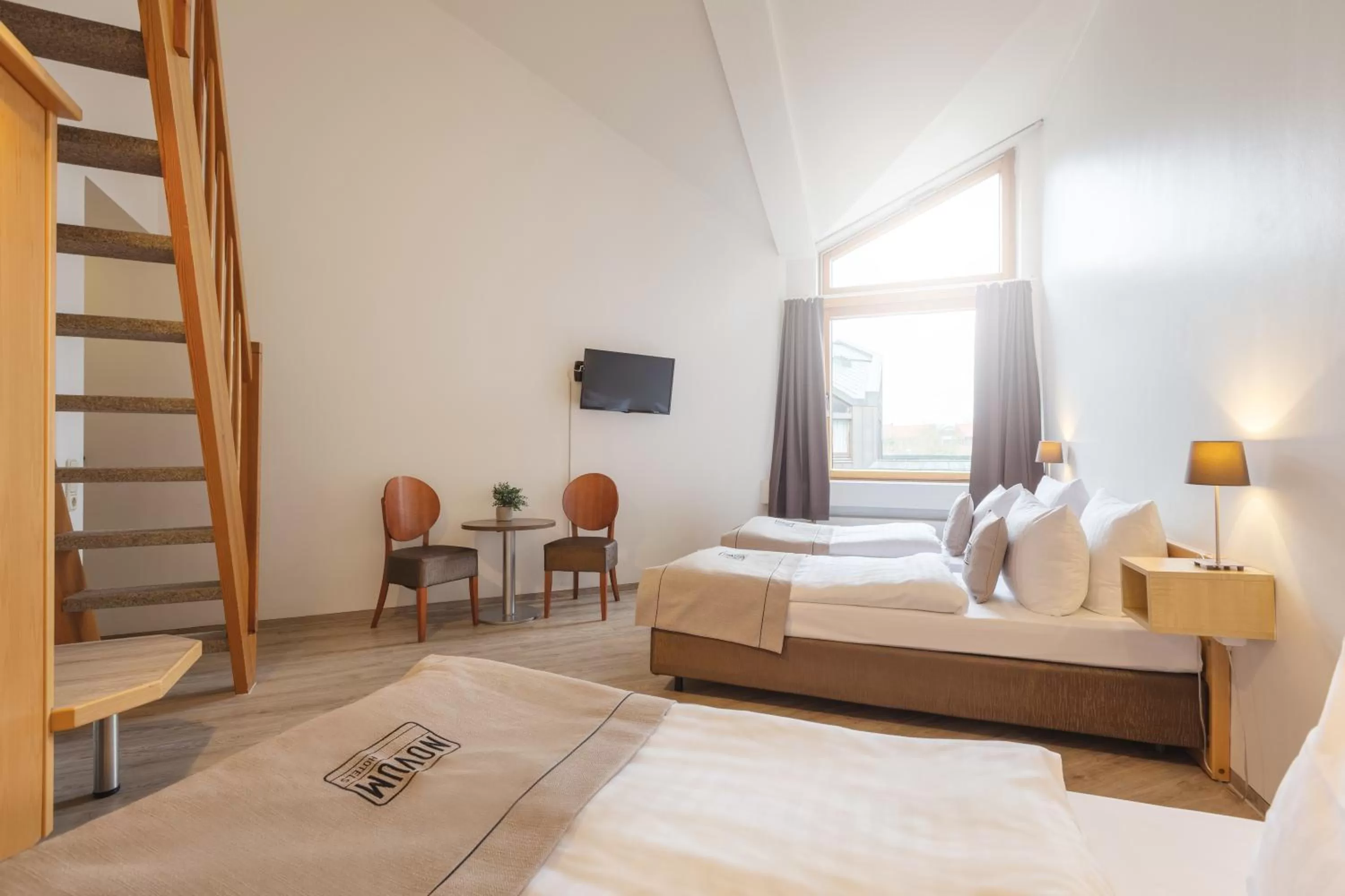 Photo of the whole room, Bed in Novum Akademiehotel Kiel