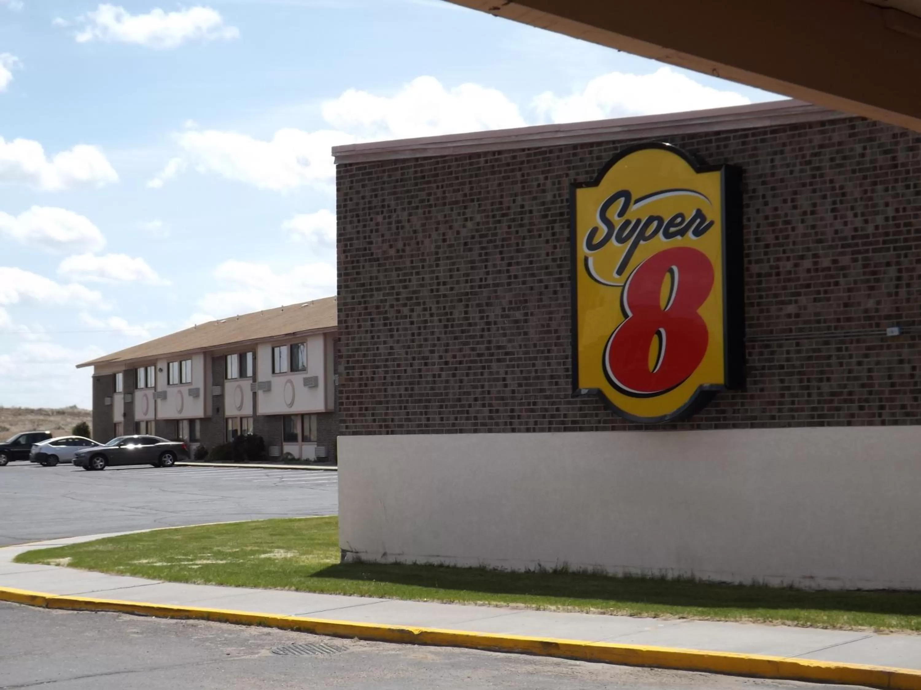 Property logo or sign in Super 8 by Wyndham Sterling CO