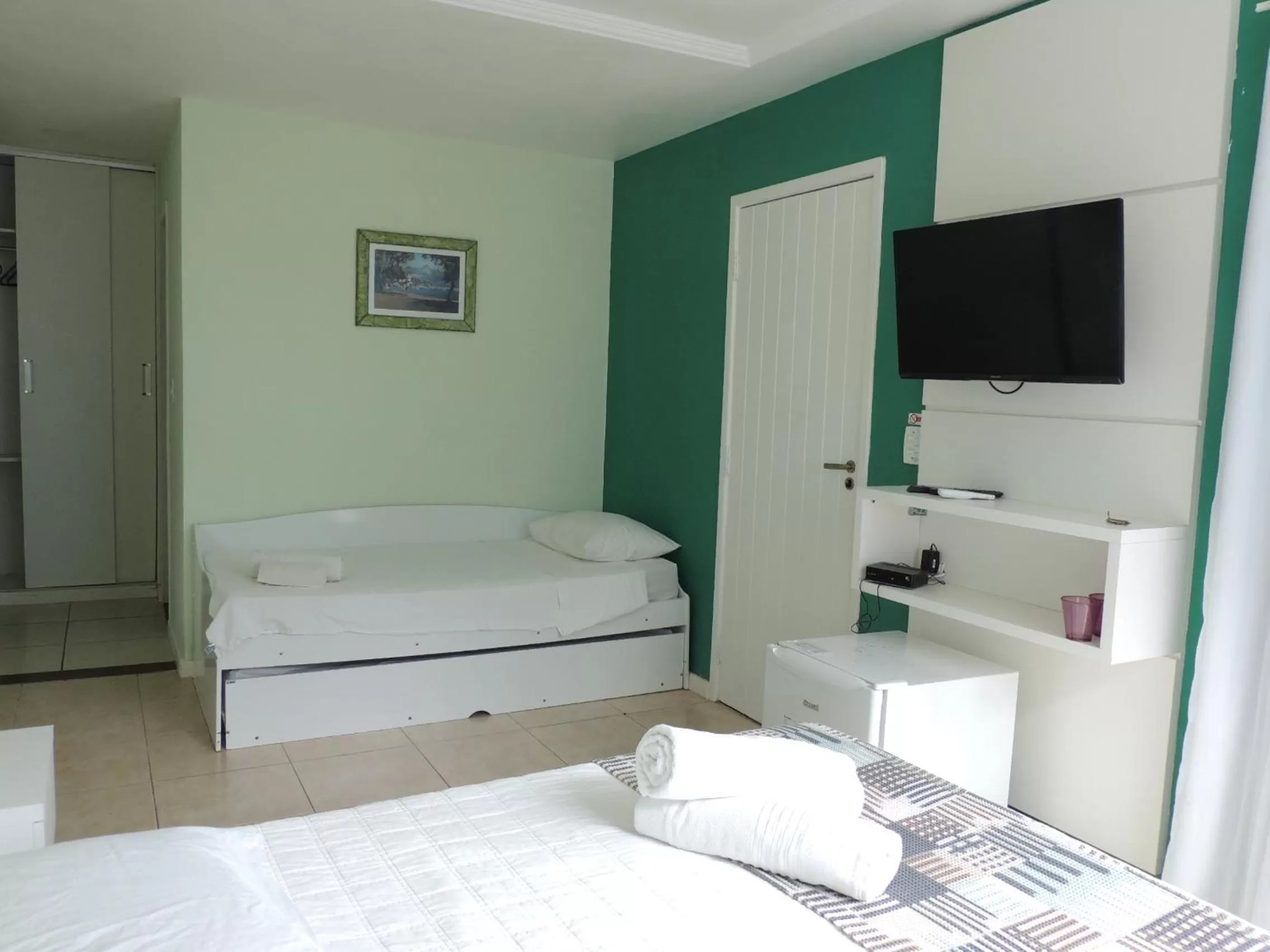 Photo of the whole room, Bed in Pousada Akaroa