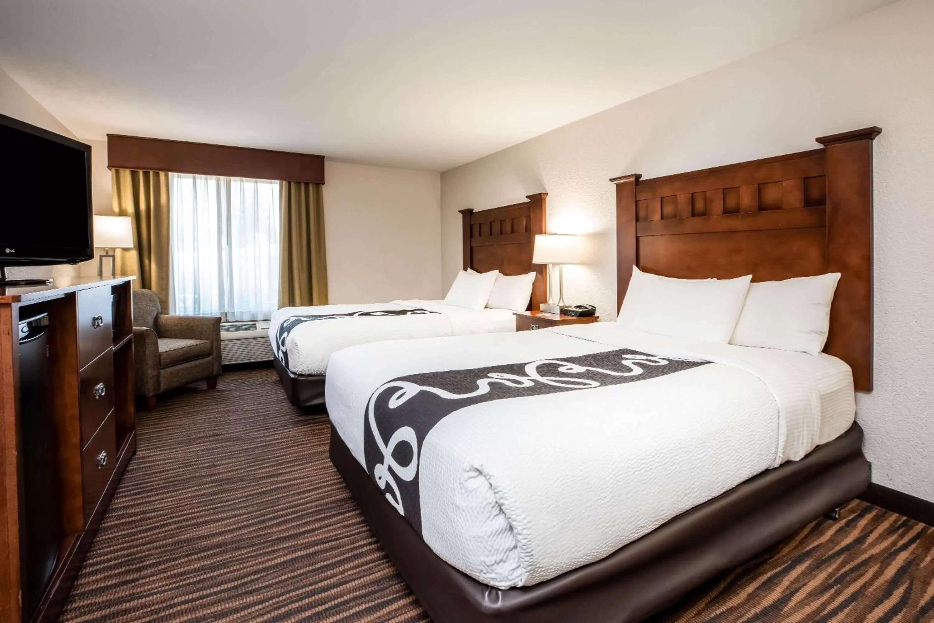 Photo of the whole room, Bed in La Quinta Inn by Wyndham Bend