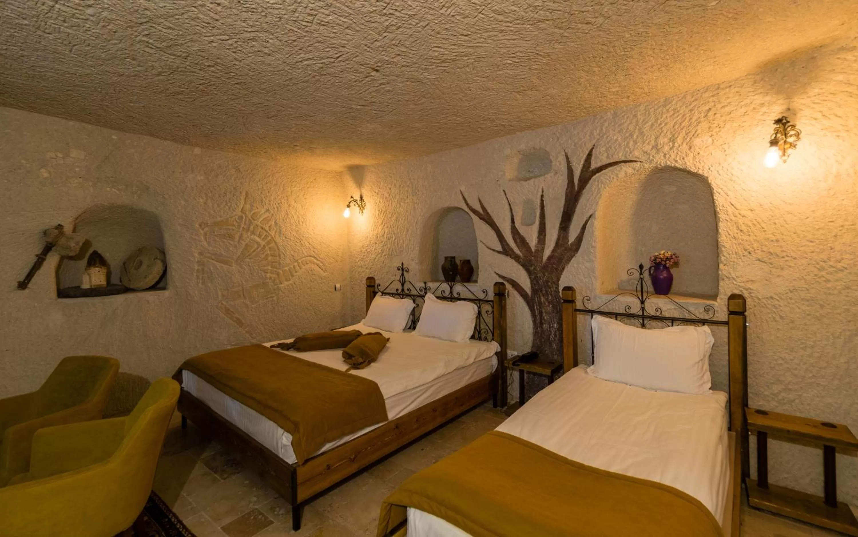 Bed in Elite Cave Suites