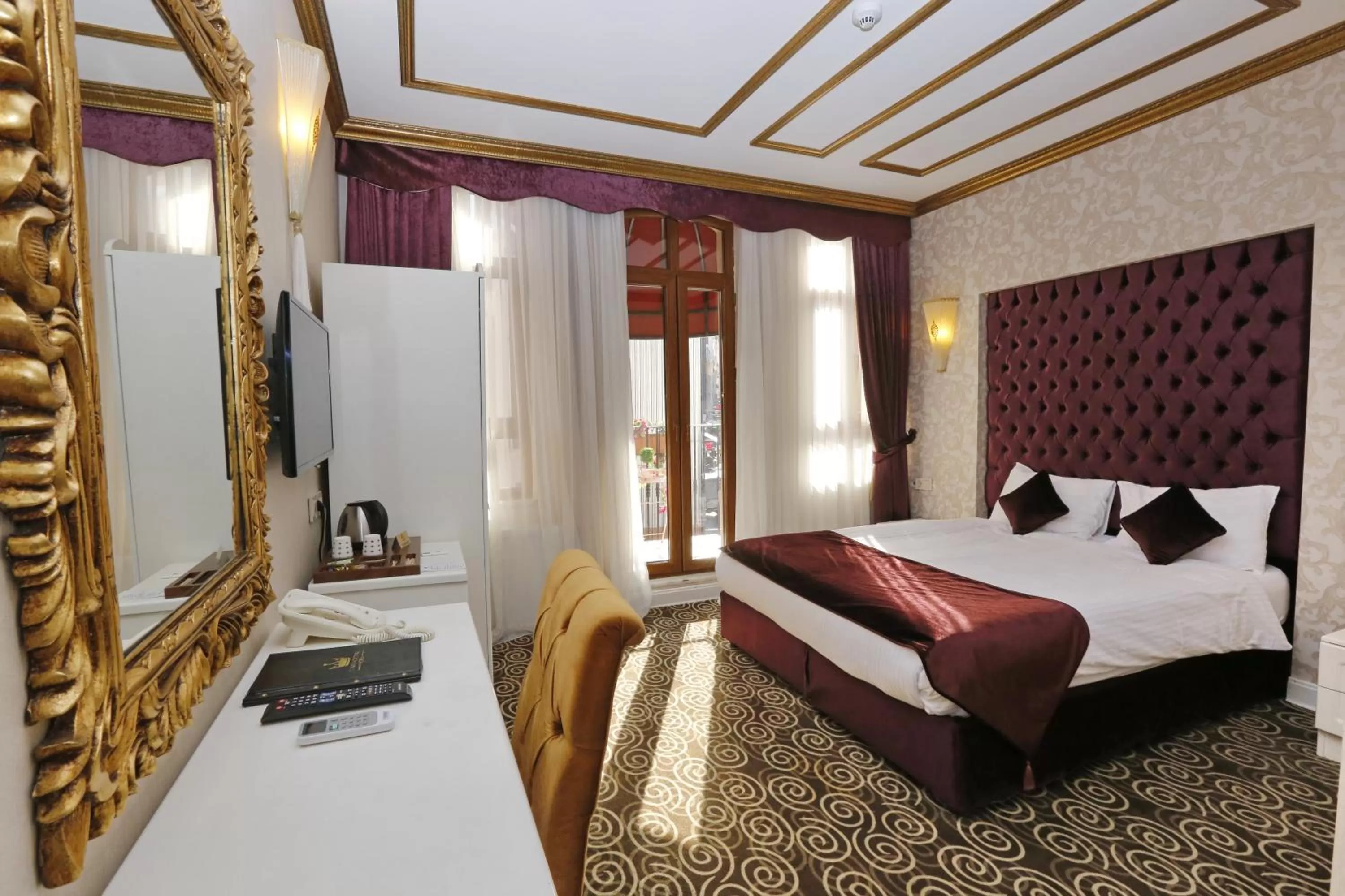 Bed in Diamond Royal Hotel