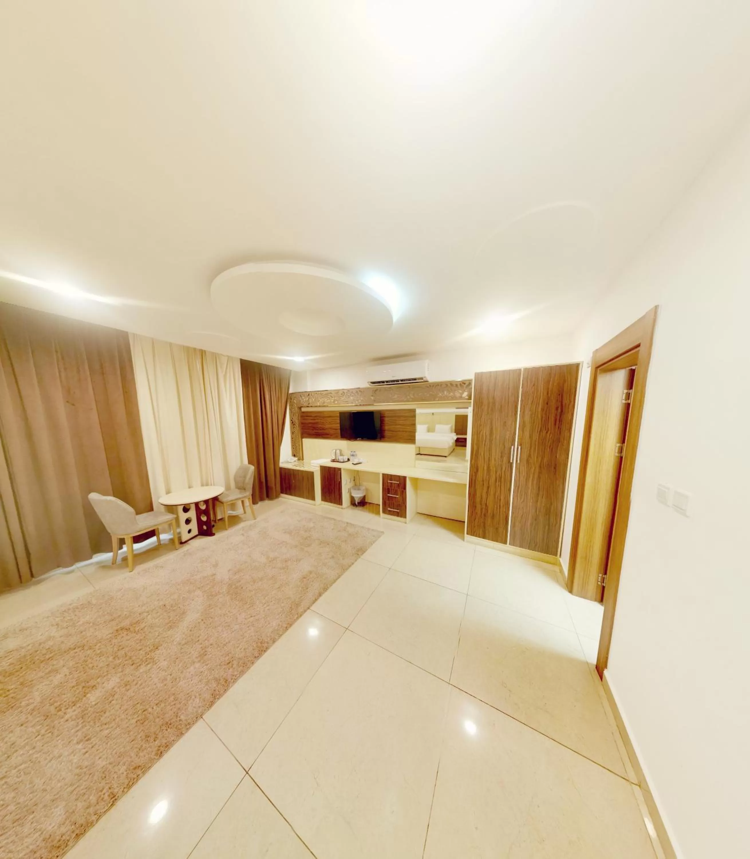 Seating area, Bed in Diamond Star Hotel فندق النجمة الماسية