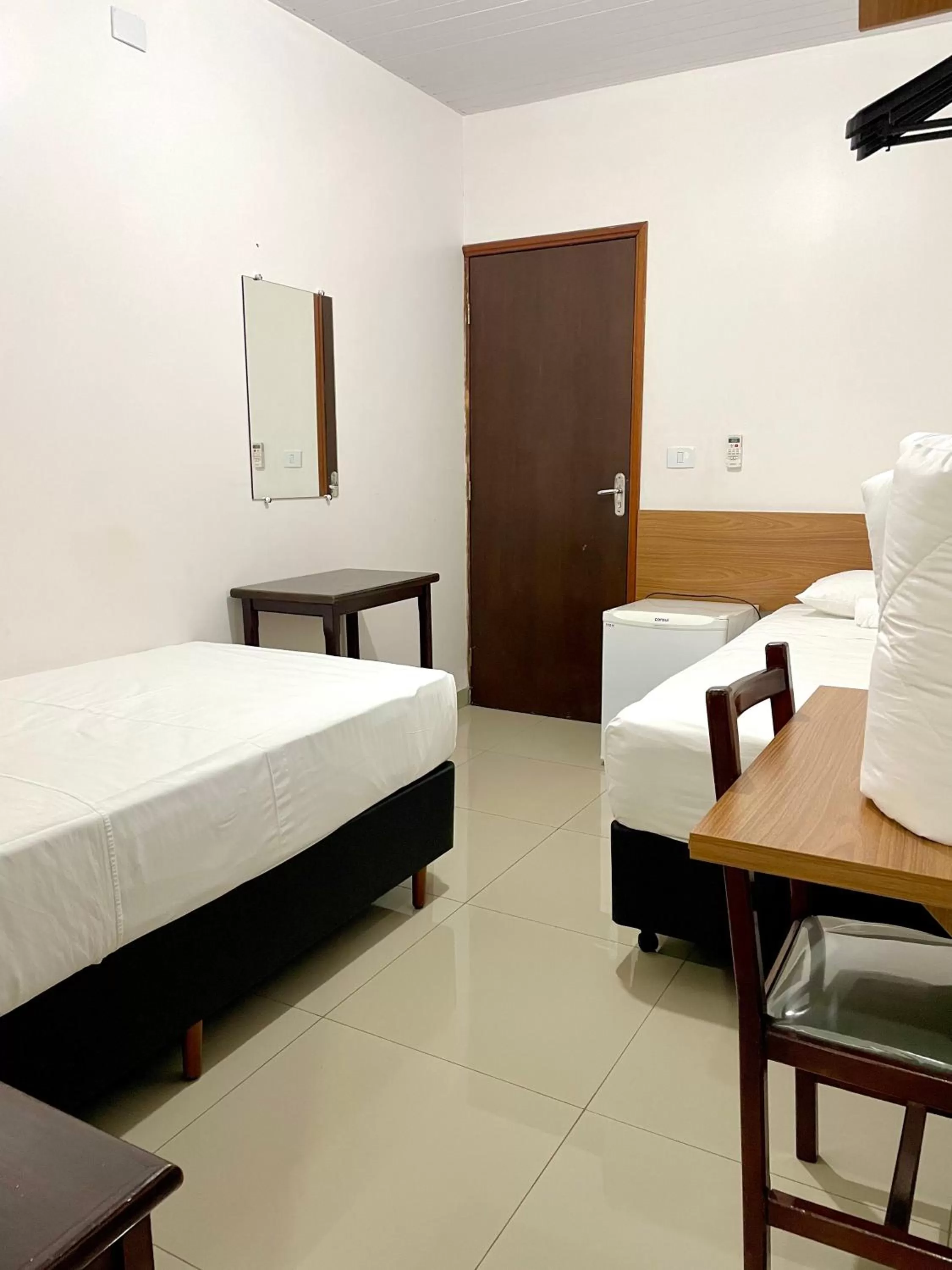 Bed in Nav Park Hotel