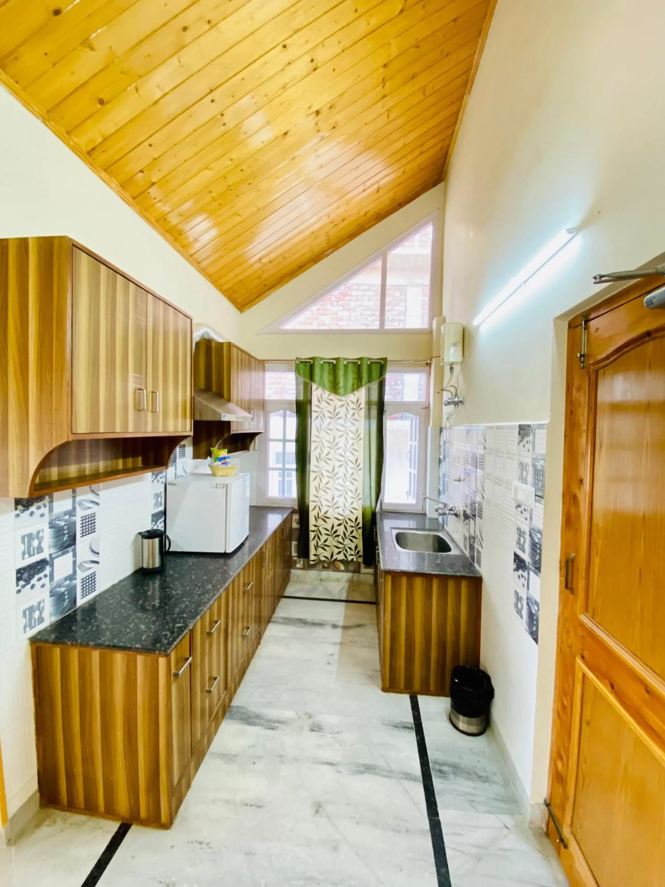 Kitchen or kitchenette in Sai Cottage Shimla