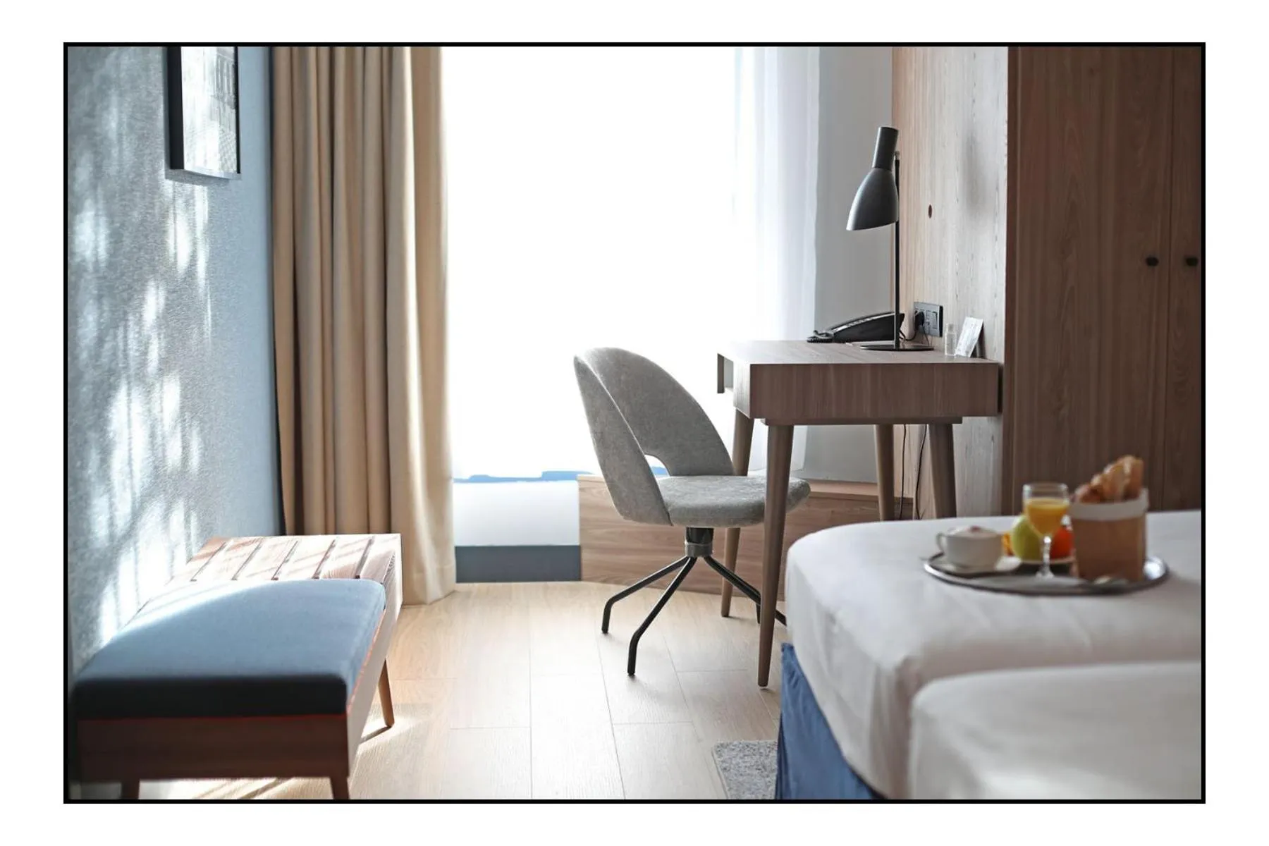 Seating area, Bed in Radisson Hotel Nice Airport