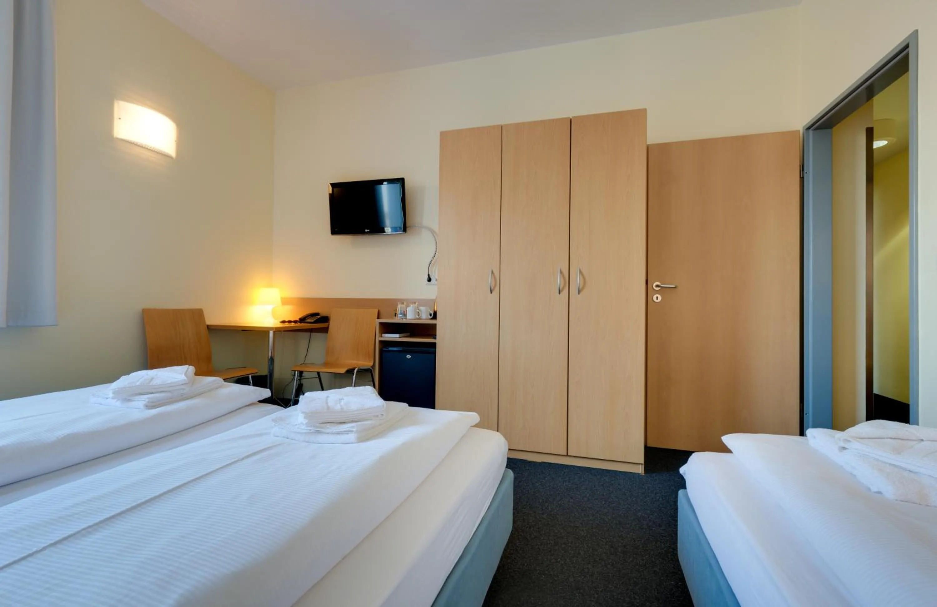 Photo of the whole room, Bed in Familienhotel Citylight