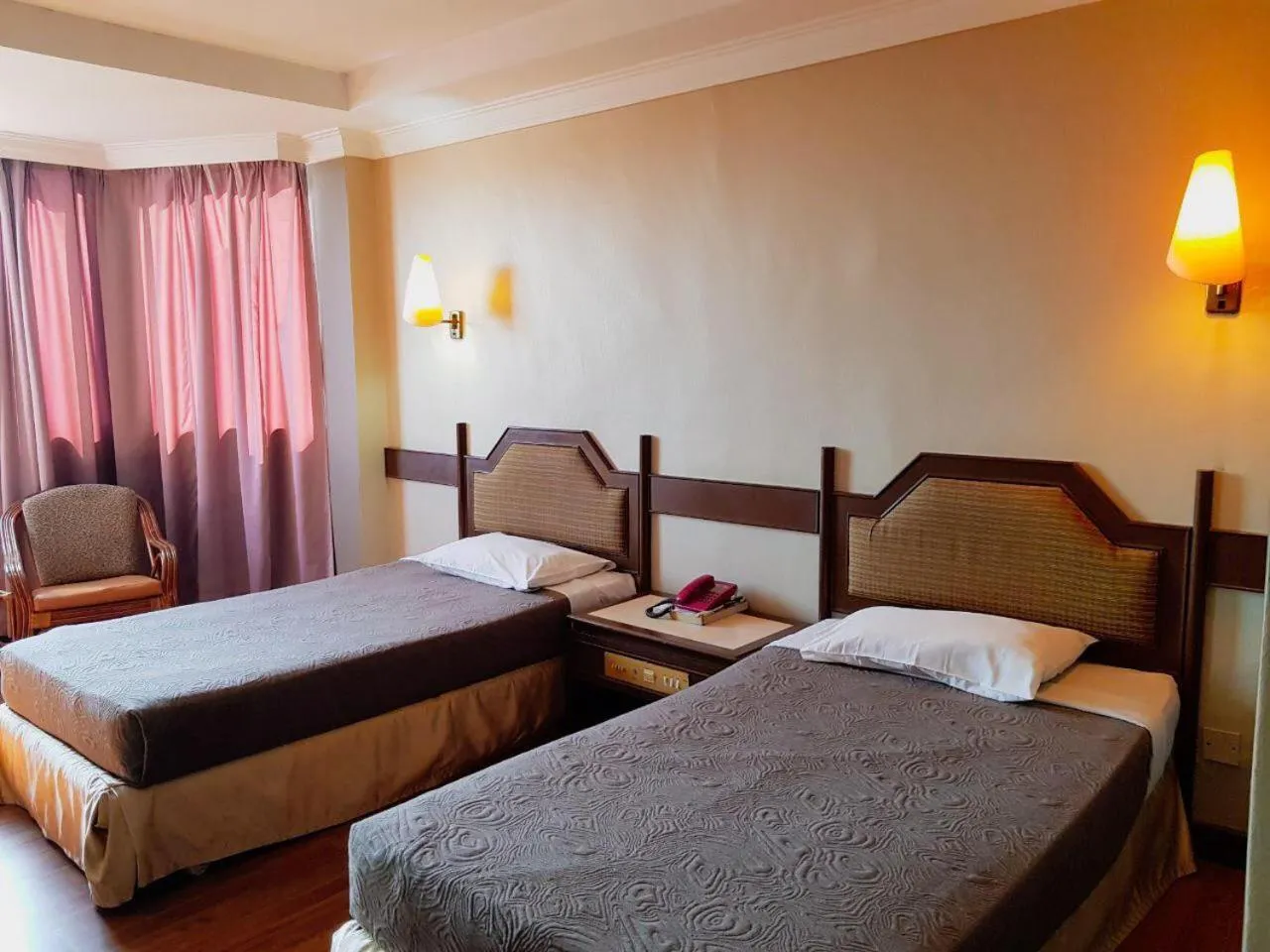 Bed in Hotel Grand Crystal