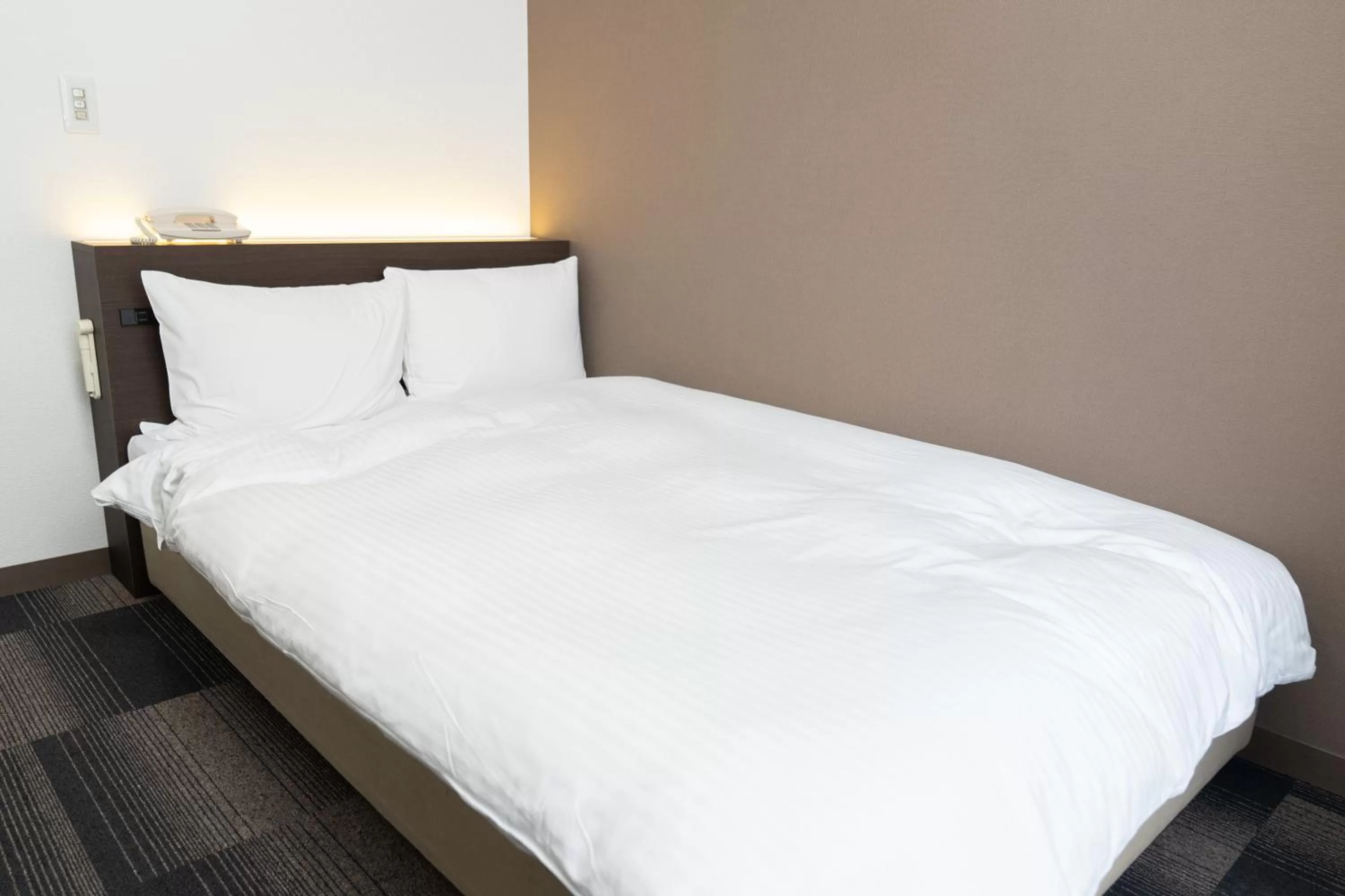 Photo of the whole room, Bed in Heiwadai Hotel Tenjin