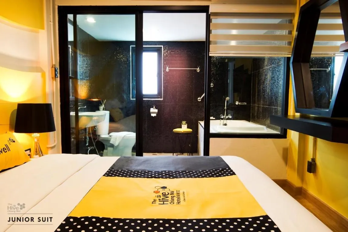 Bed in The Hive Chiang Mai Hotel