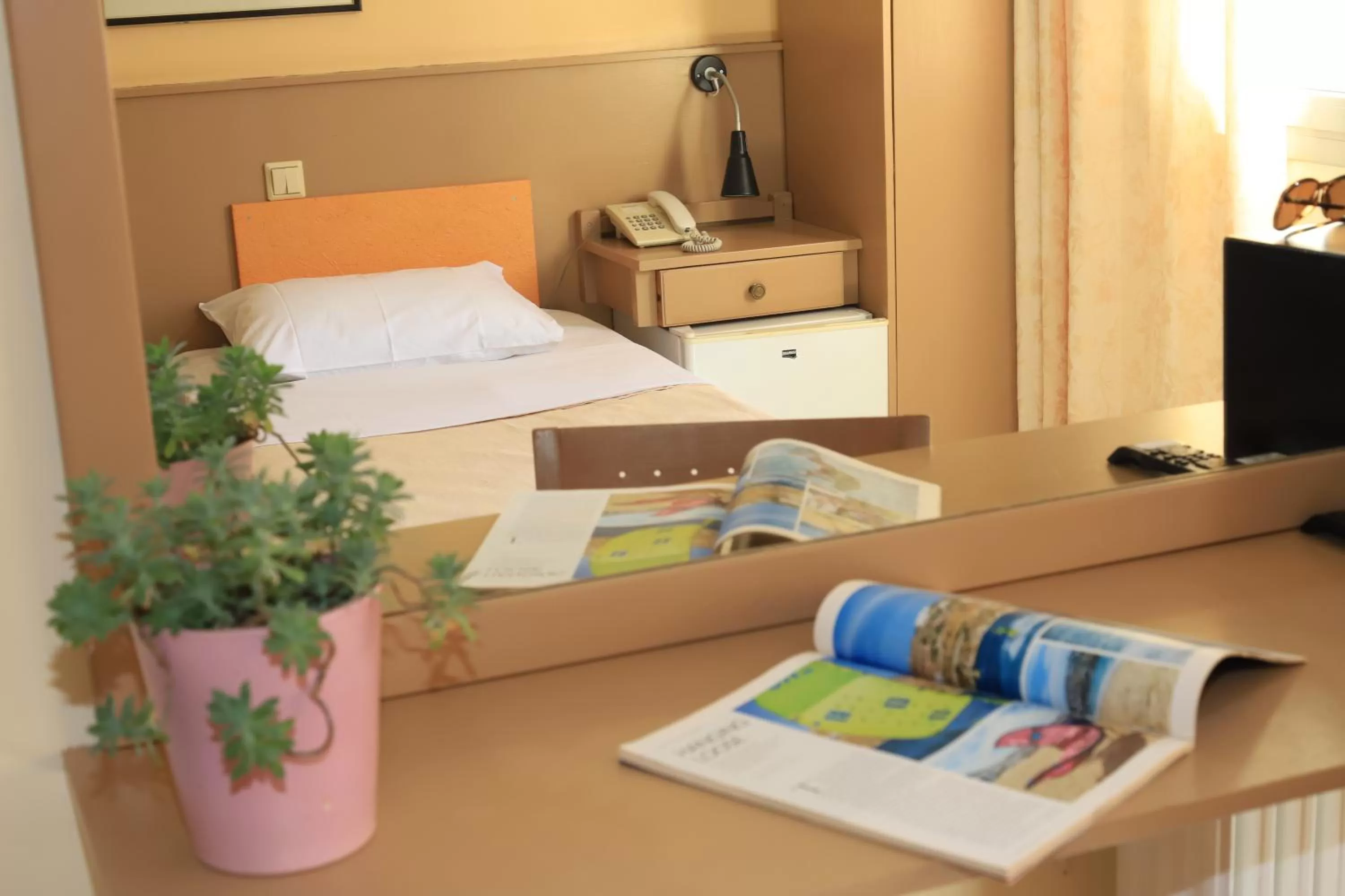 Bed in IKAROS Hotel ELLINIKO