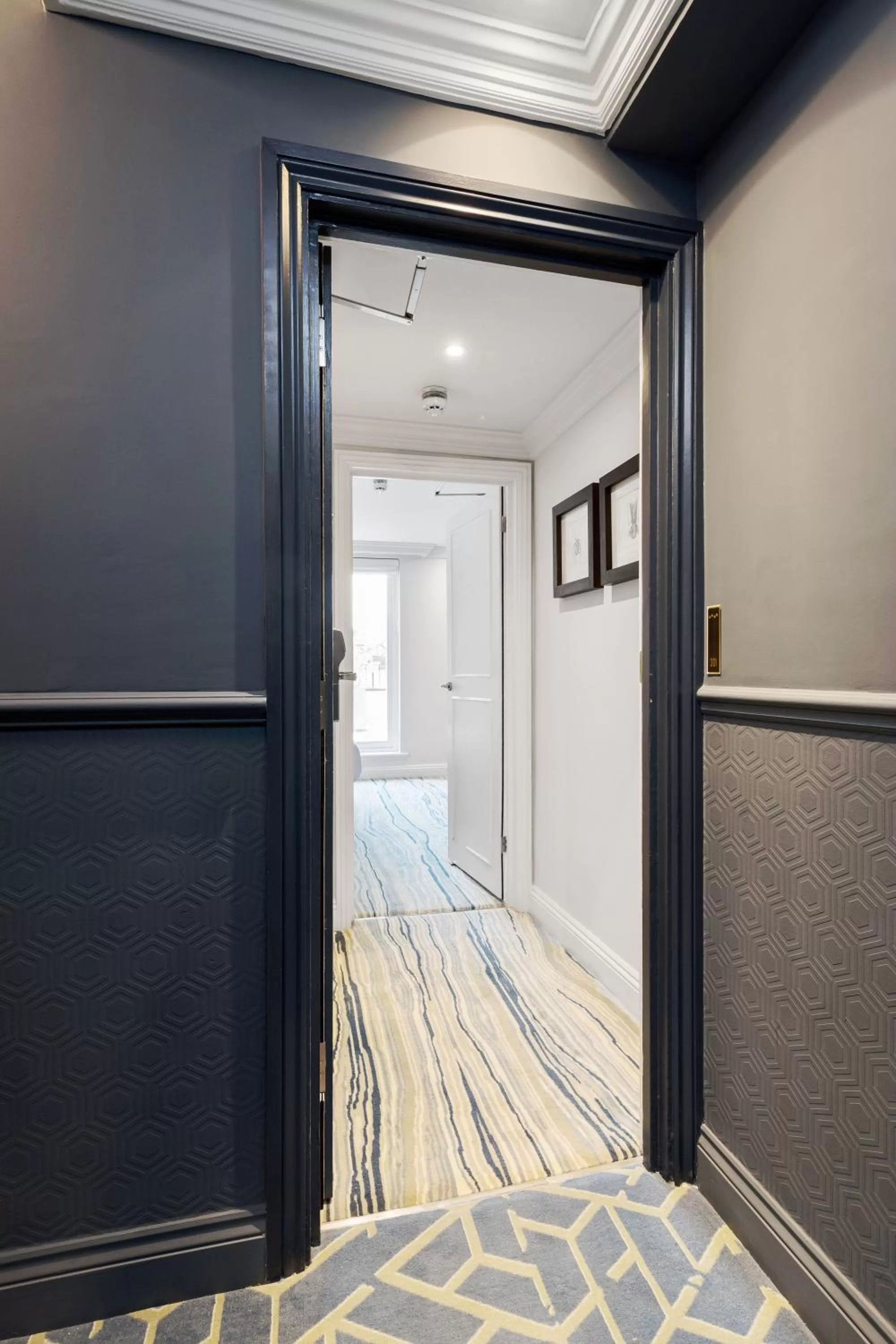 Bed in Commodore Hotel