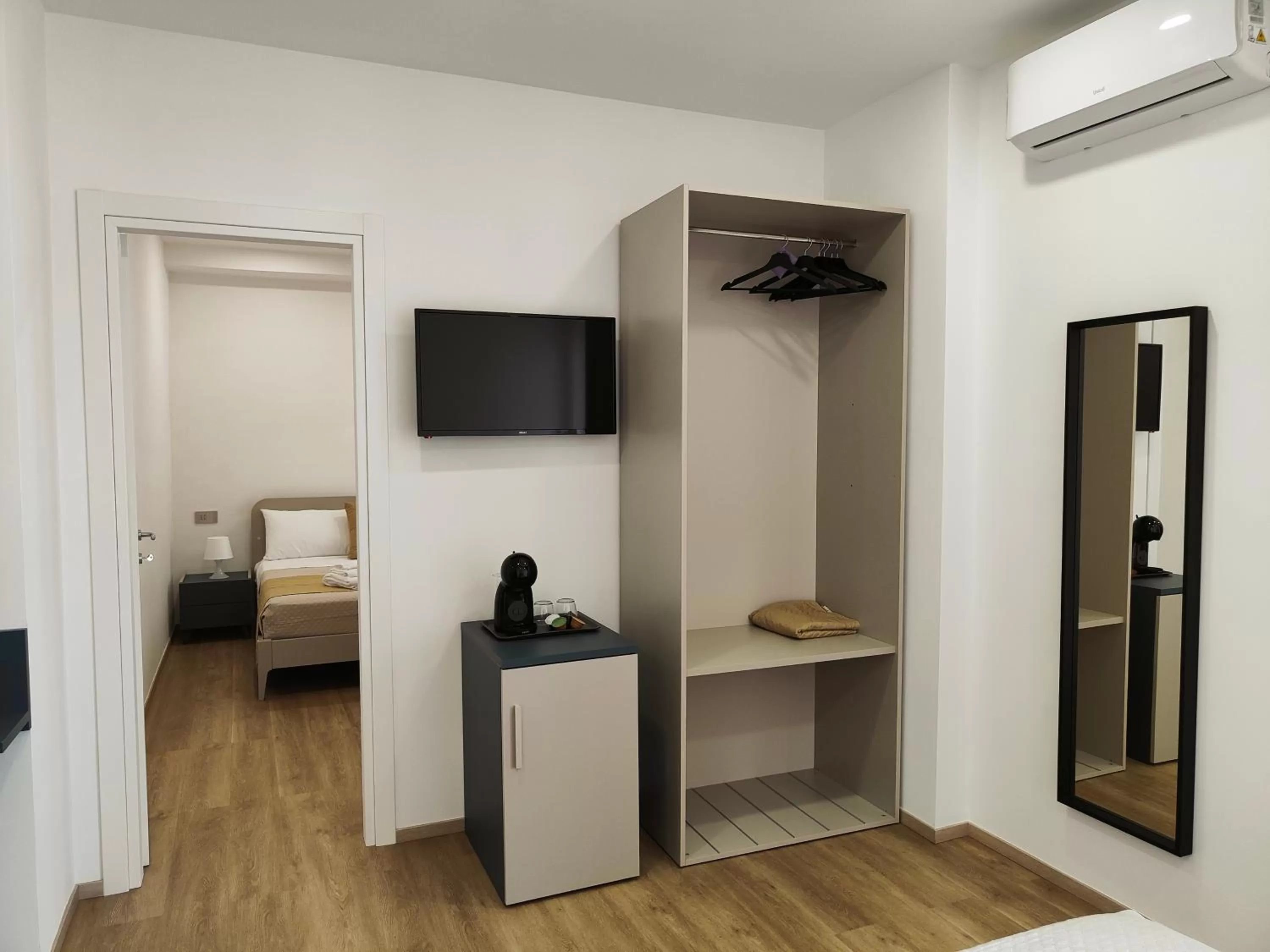 TV and multimedia, TV/Entertainment Center in Pompeya Bed and Breakfast