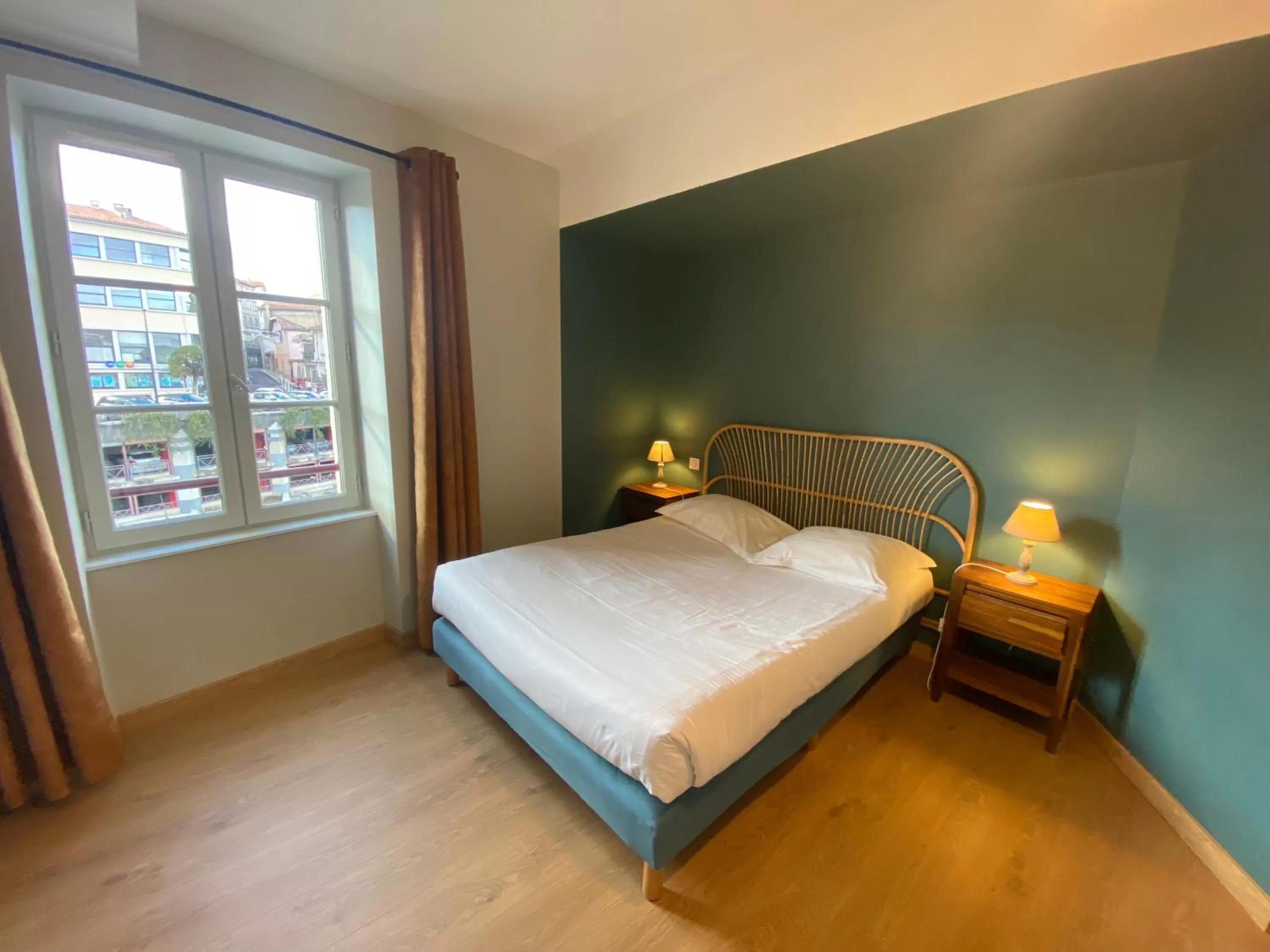 Bedroom in Le Miredames Hôtel-Bar