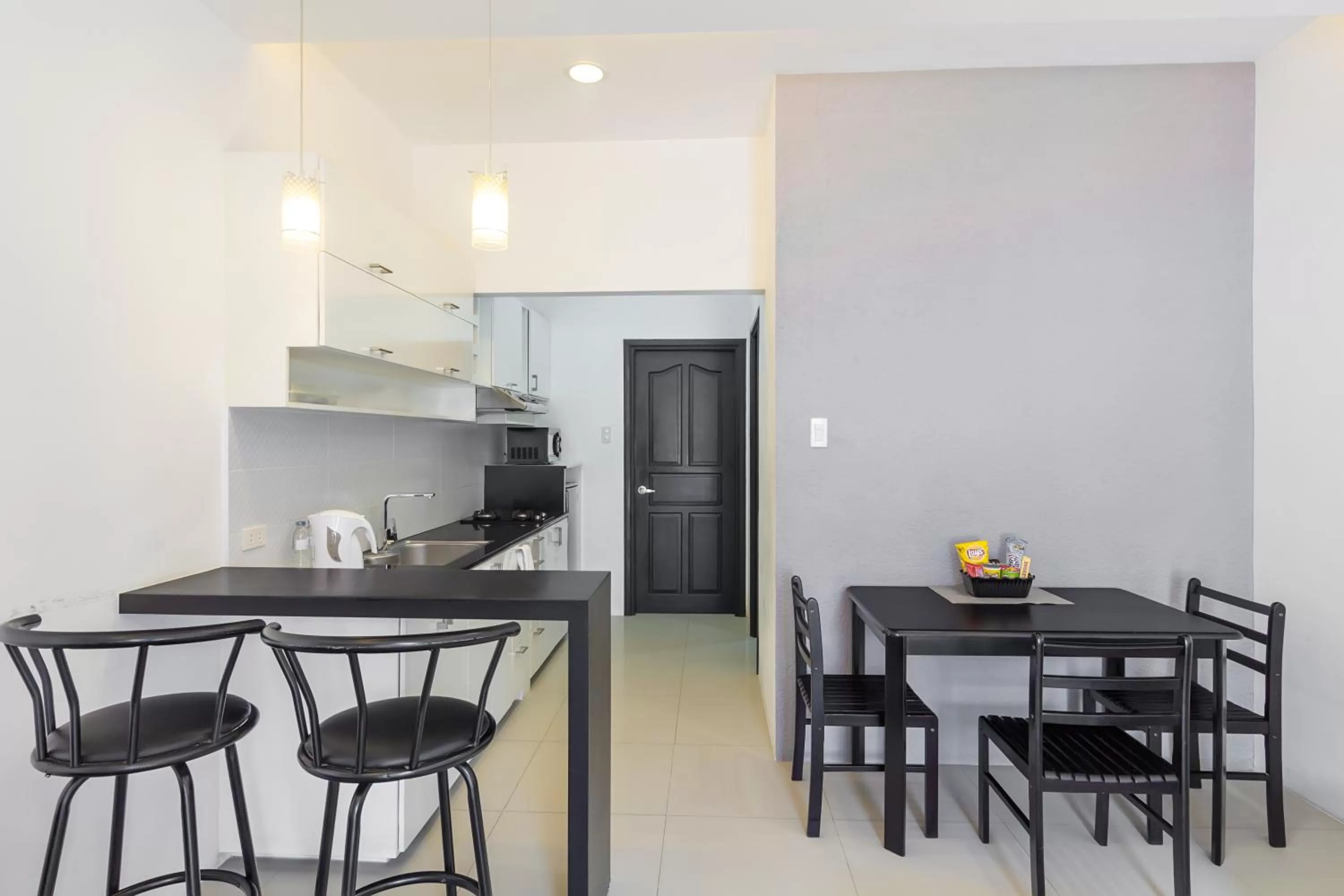 Kitchen or kitchenette in Winds Boutique Hotel