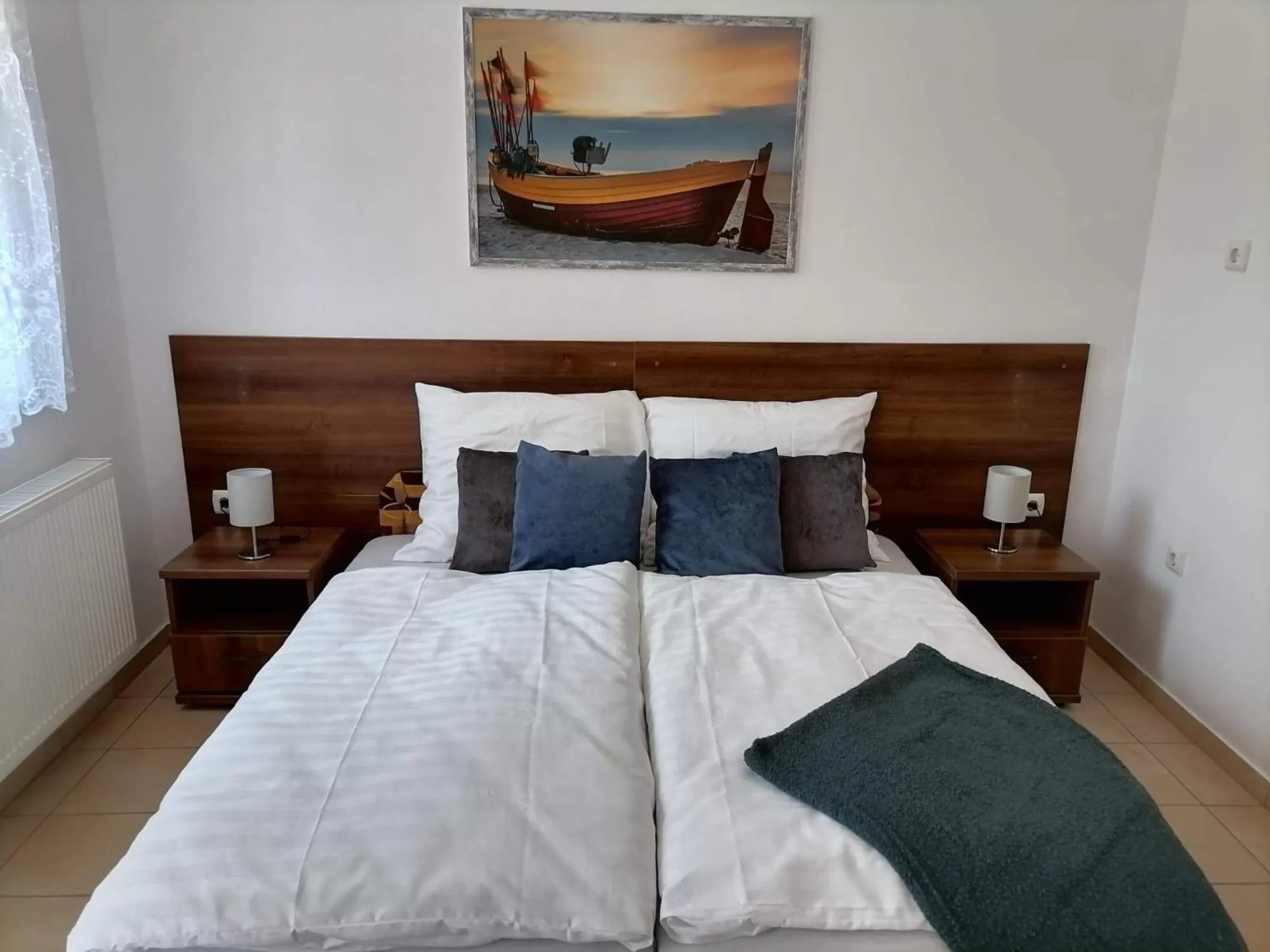 Bed in Aqua Oazis Apartman
