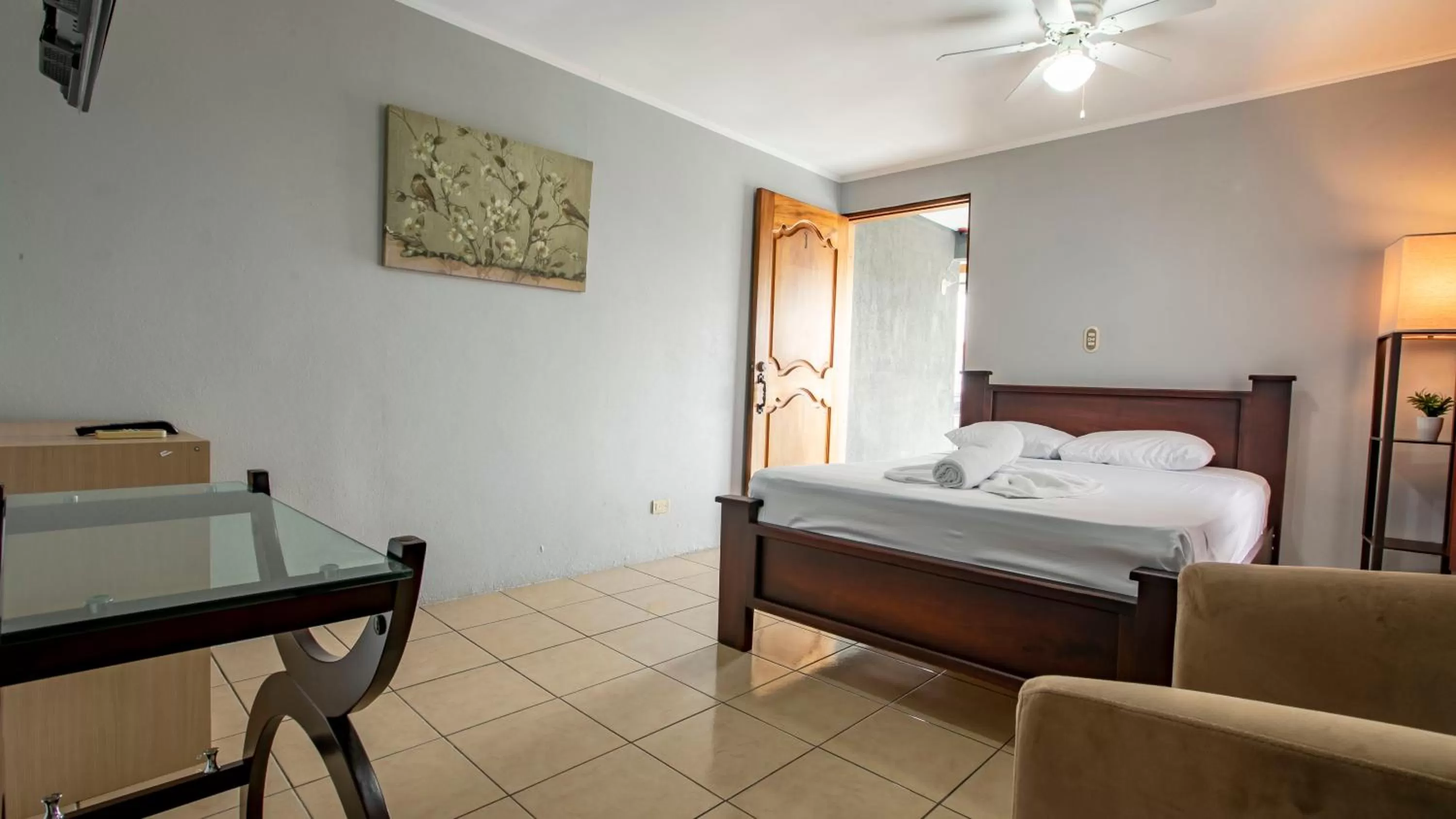 Bed in Coati Arenal Lodge