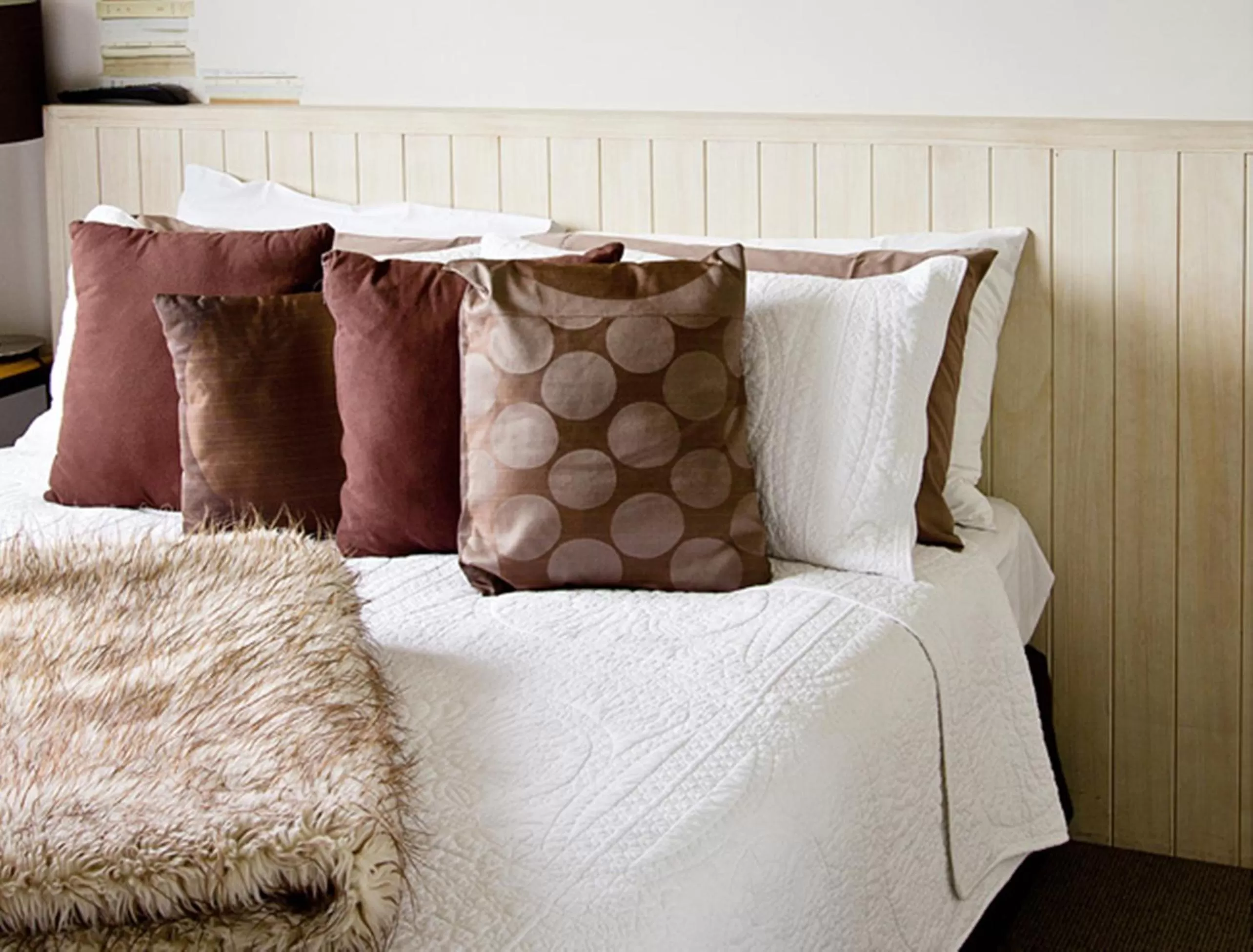 Bed in Blenheim Palms Motel