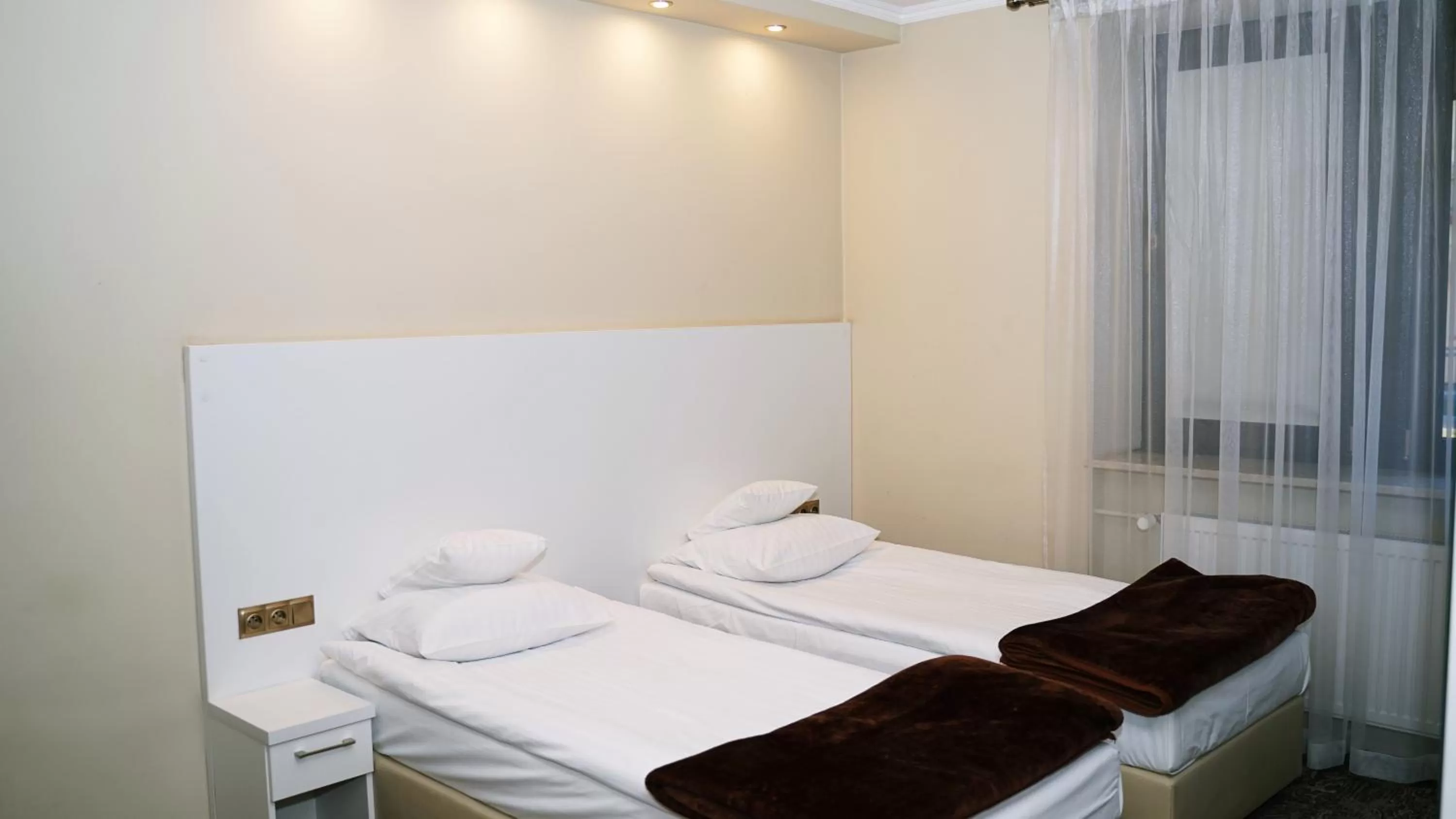 Bed in Hotel Promien