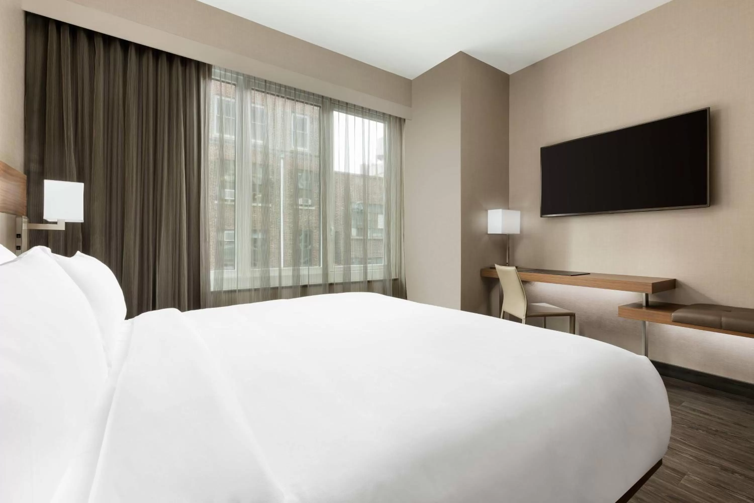 Photo of the whole room, Bed in AC Hotel by Marriott New York Times Square