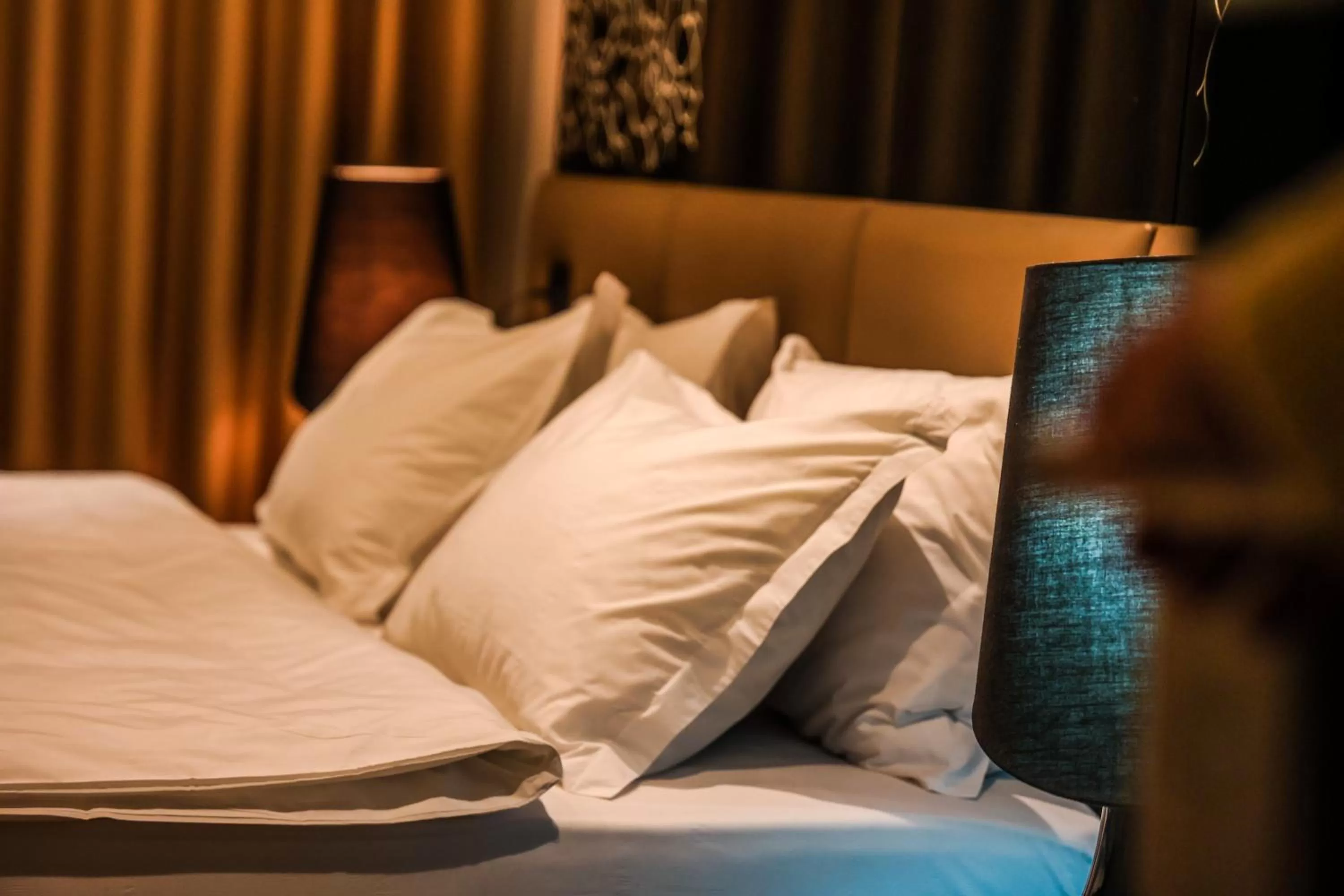 Bed in Senator Hotel