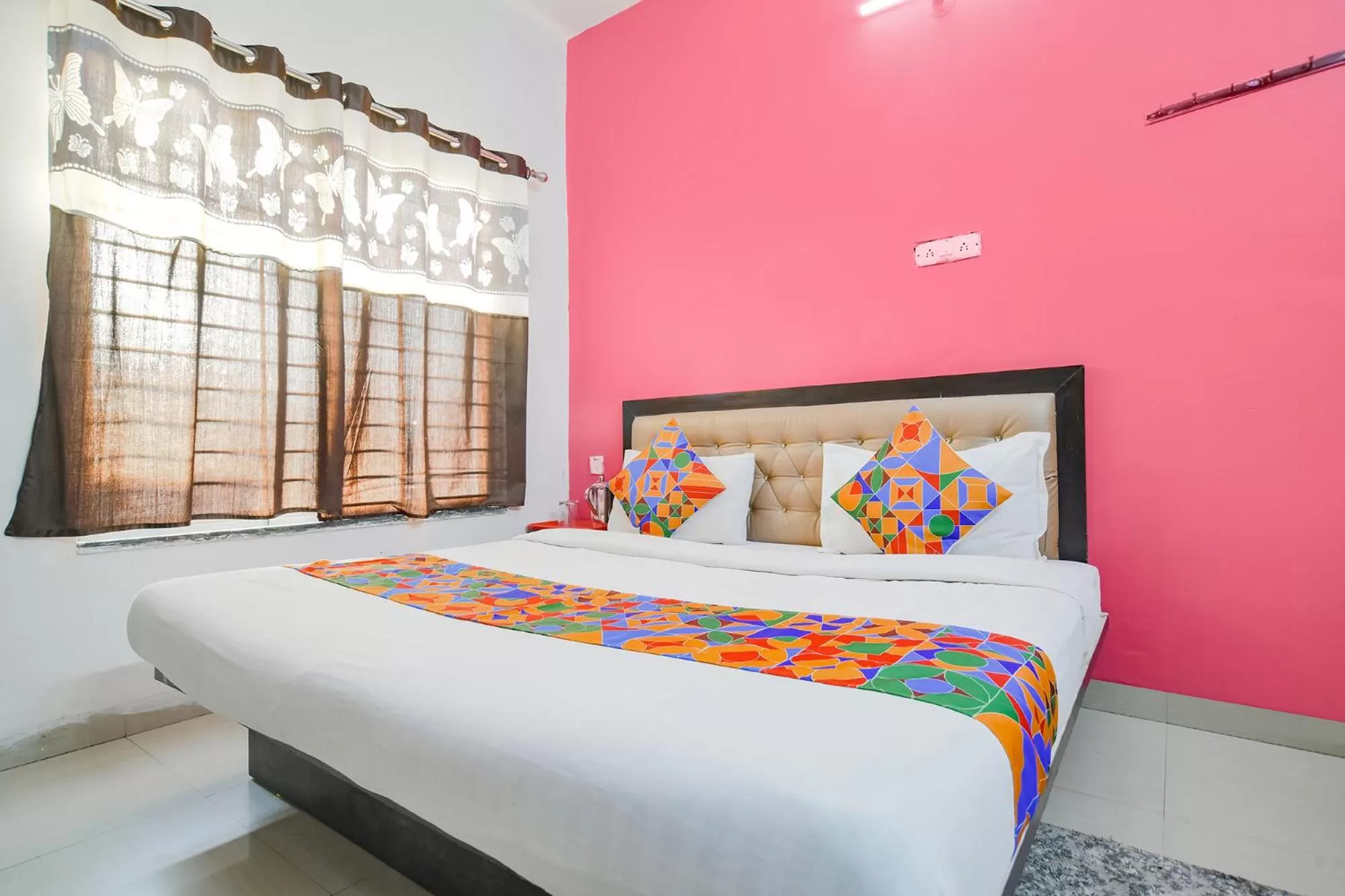 Bed in FabExpress Royal Palace Inn