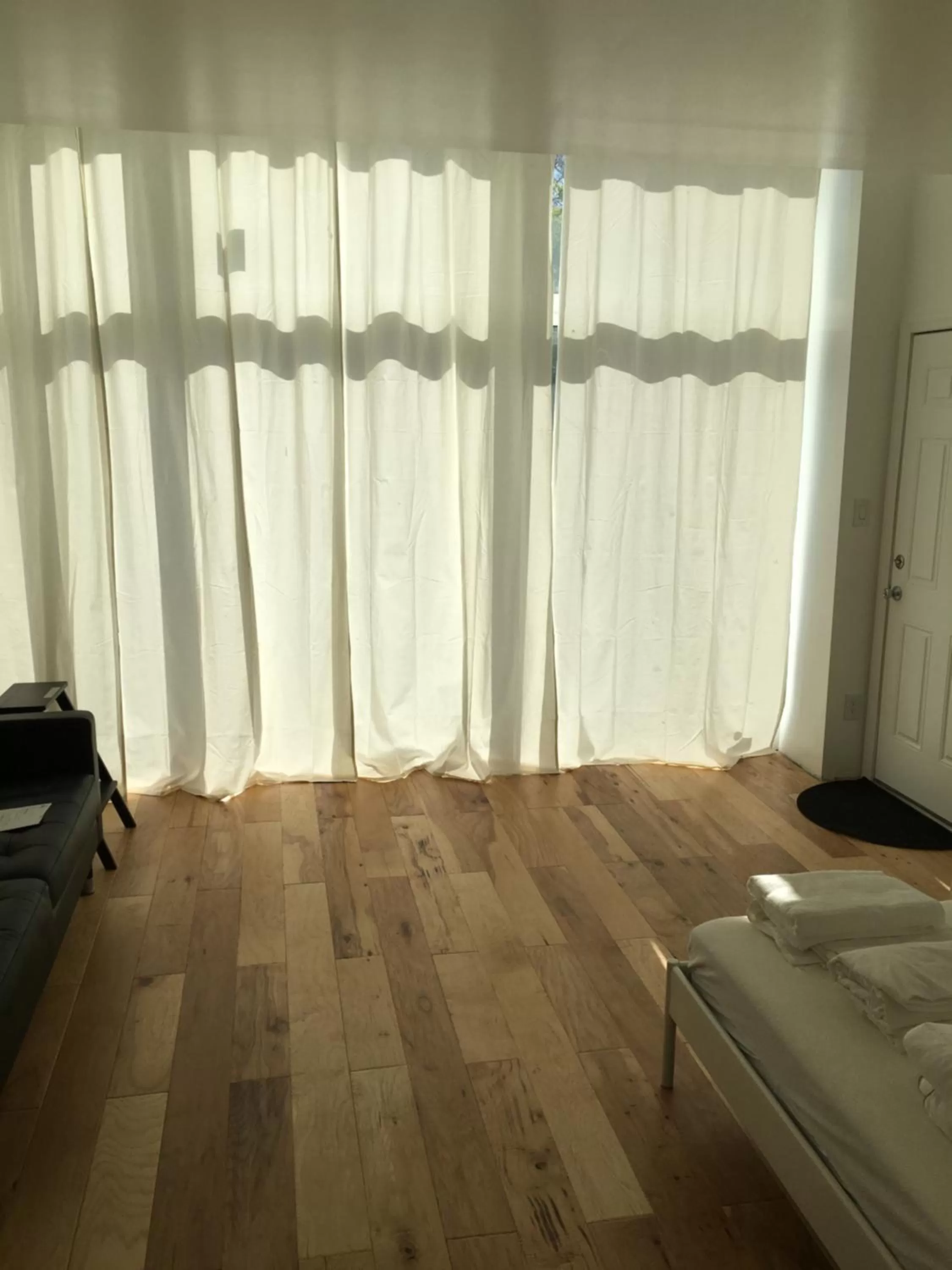 Bedroom, TV/Entertainment Center in Apartment Ocean Block