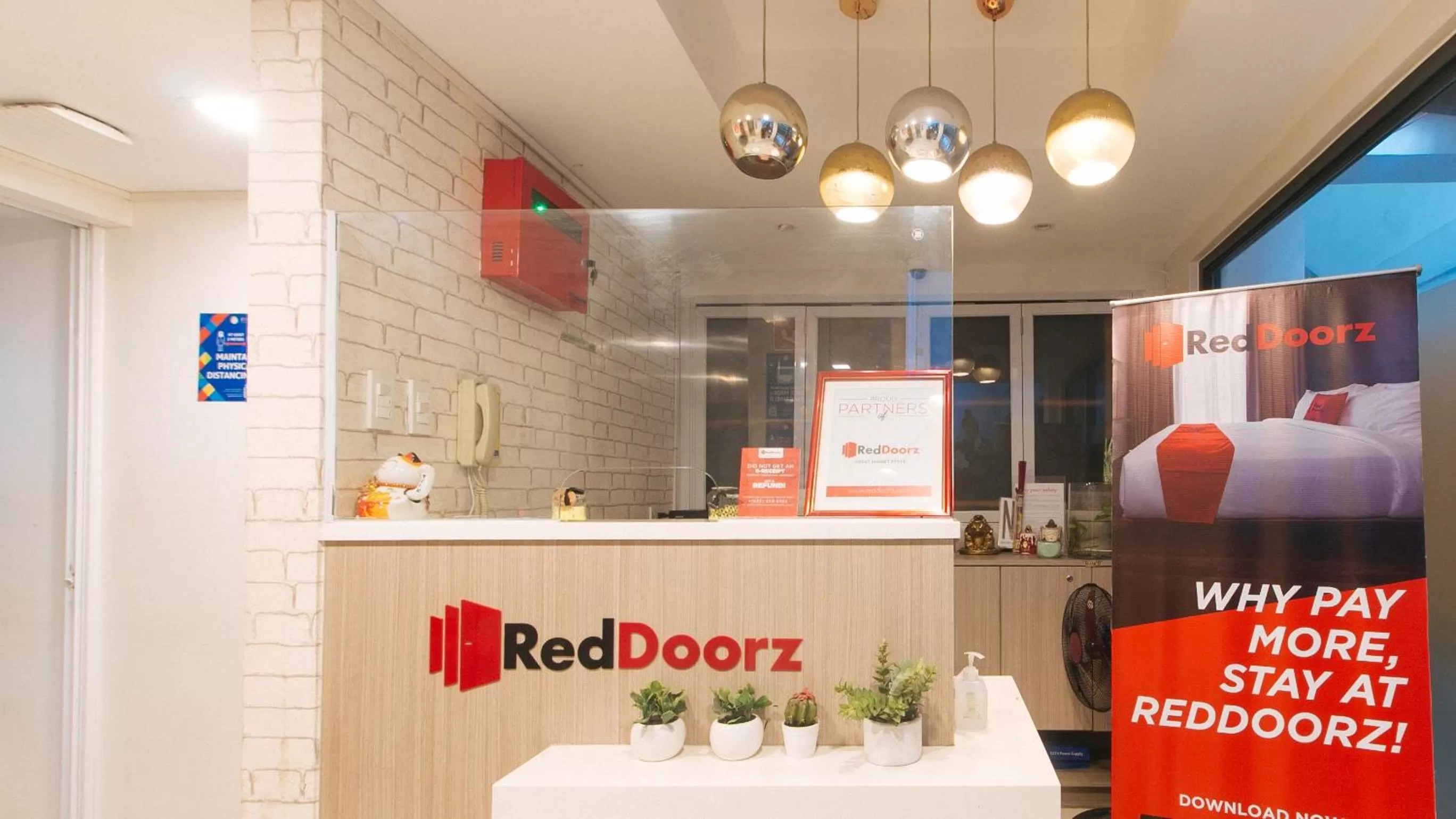 Lobby or reception in RedDoorz Plus at La Belle Residences Makati City