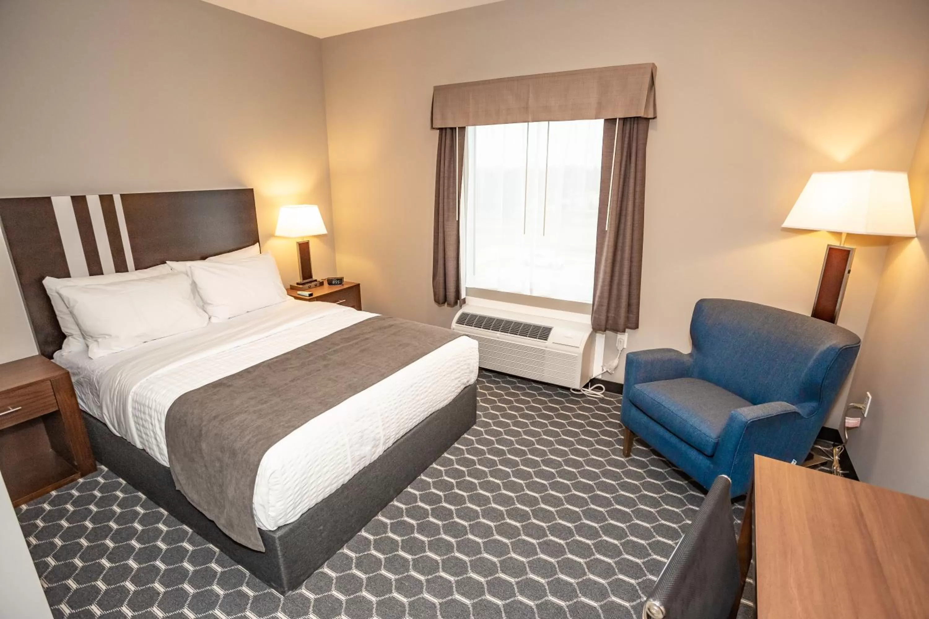 Bed in Carman Blue Crescent Hotel