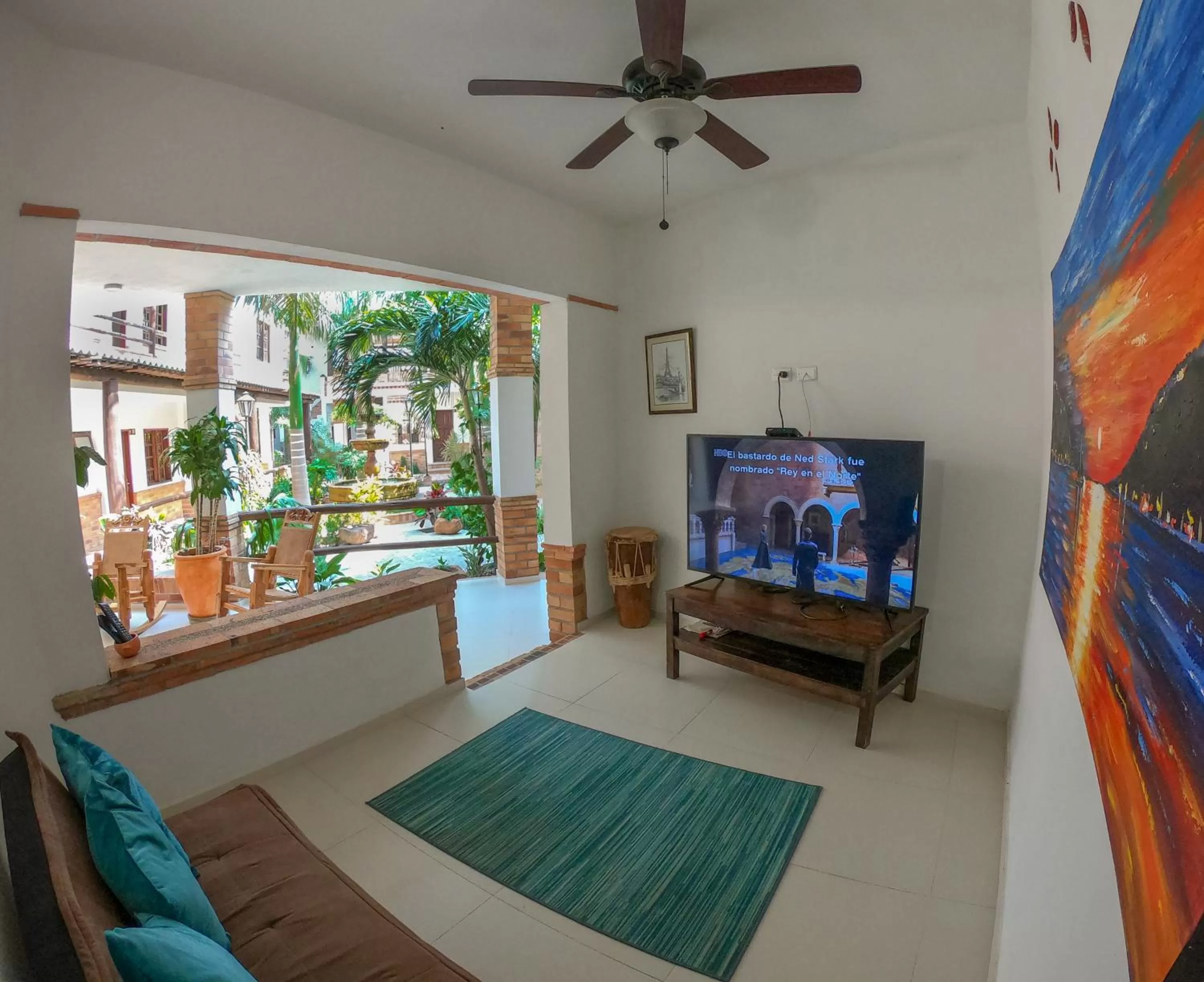 Communal lounge/ TV room in Camali Hotel