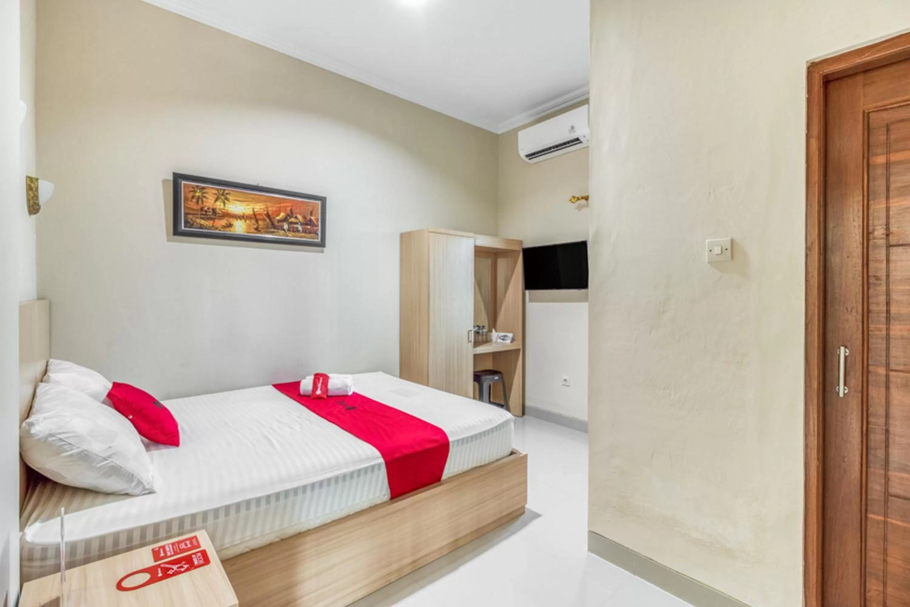 Bed in RedDoorz near Jogja National Museum