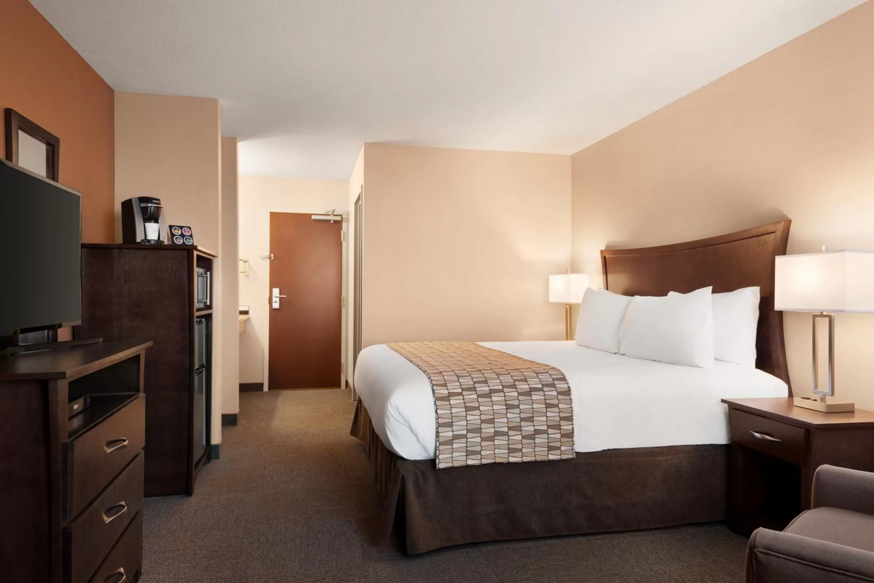 Bed in Travelodge by Wyndham Pincher Creek