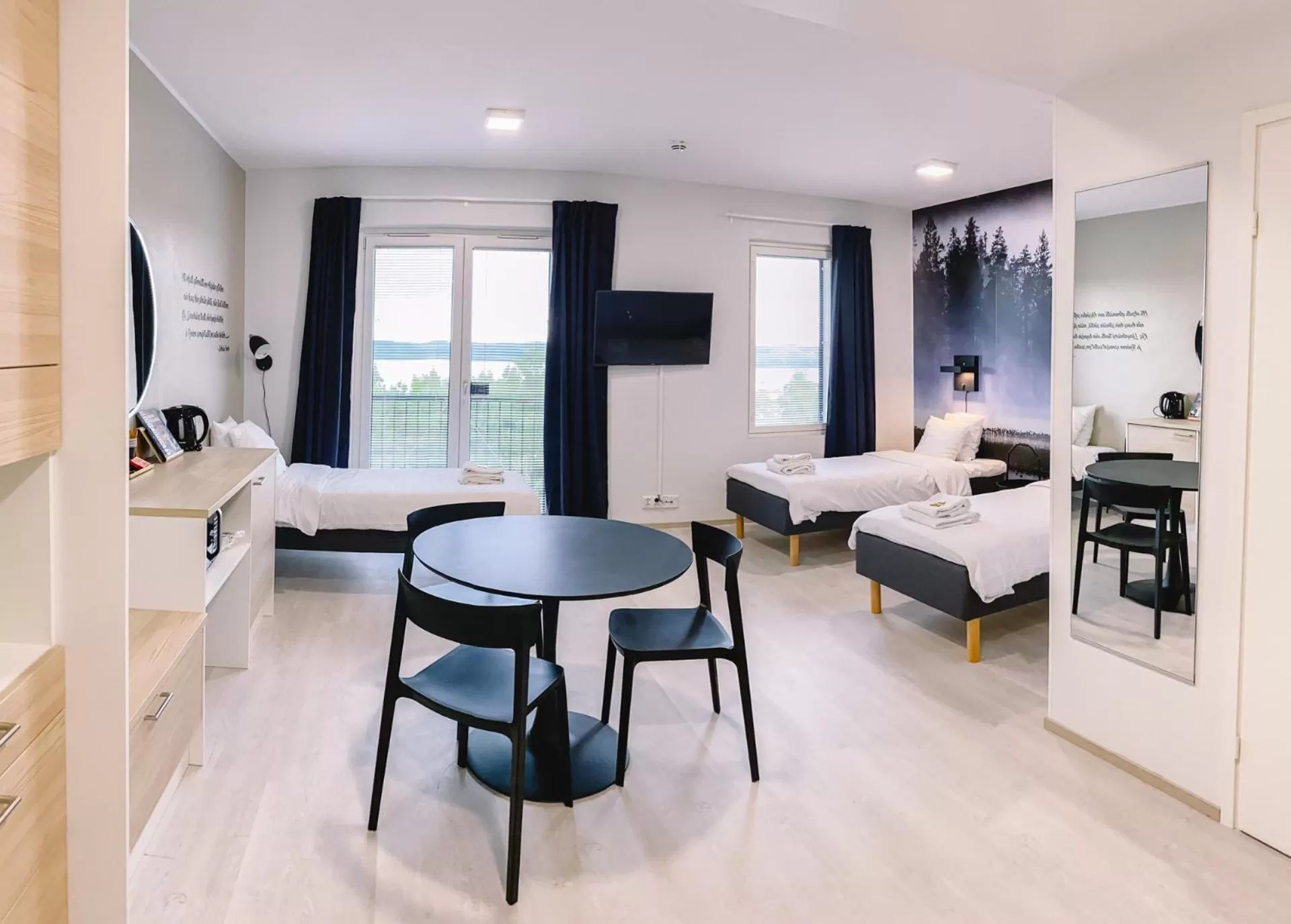 Bed in Hotelli Kuohu Kangasala - Hotel and Apartments by UHANDA