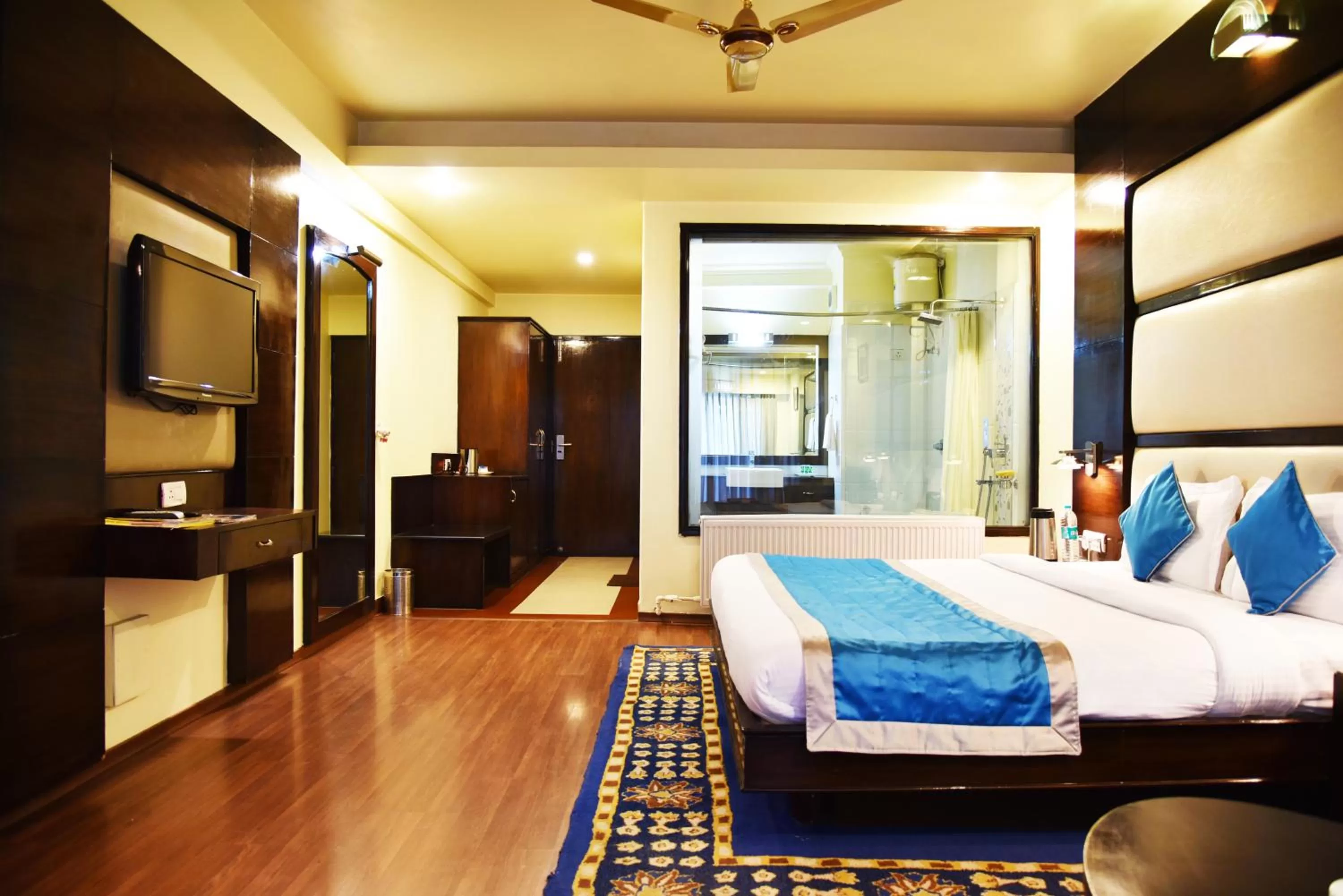Photo of the whole room, Bed in Indraprastha Resort - Centrally Heated Rooms, with Gym, Games & Spa